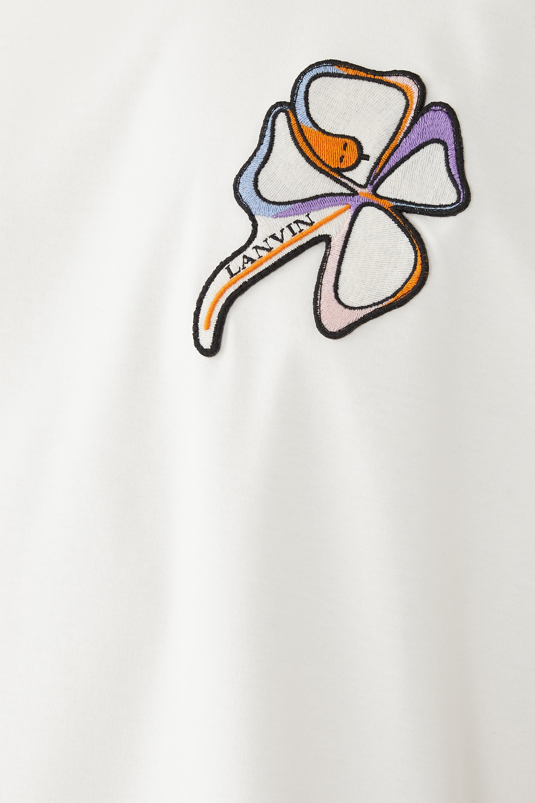 تيشيرت برقعة ثعبان بنمط برسيم بأربع أوراق