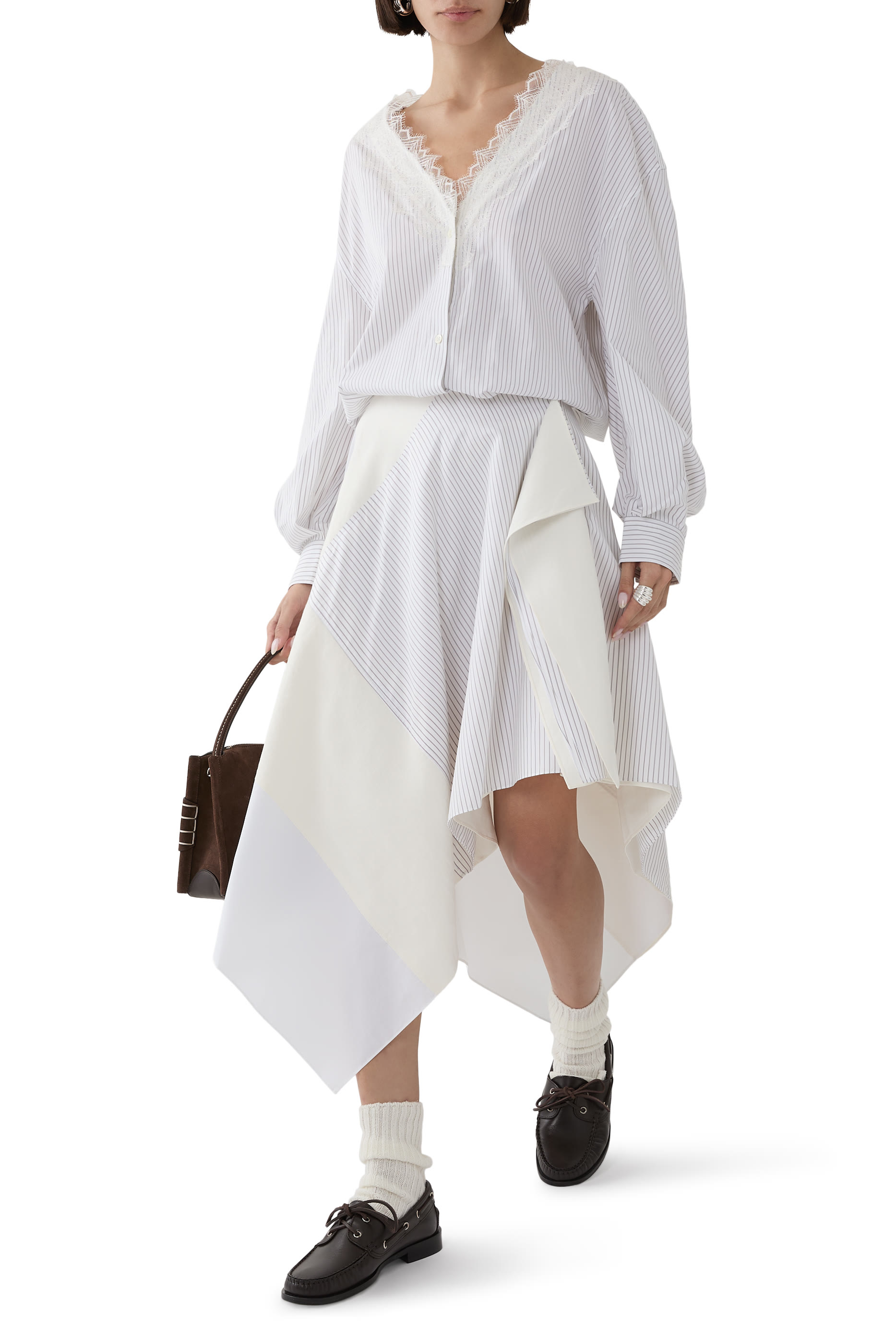 تنورة قصيرة بتصميم غير متماثل ونقشة رقعات