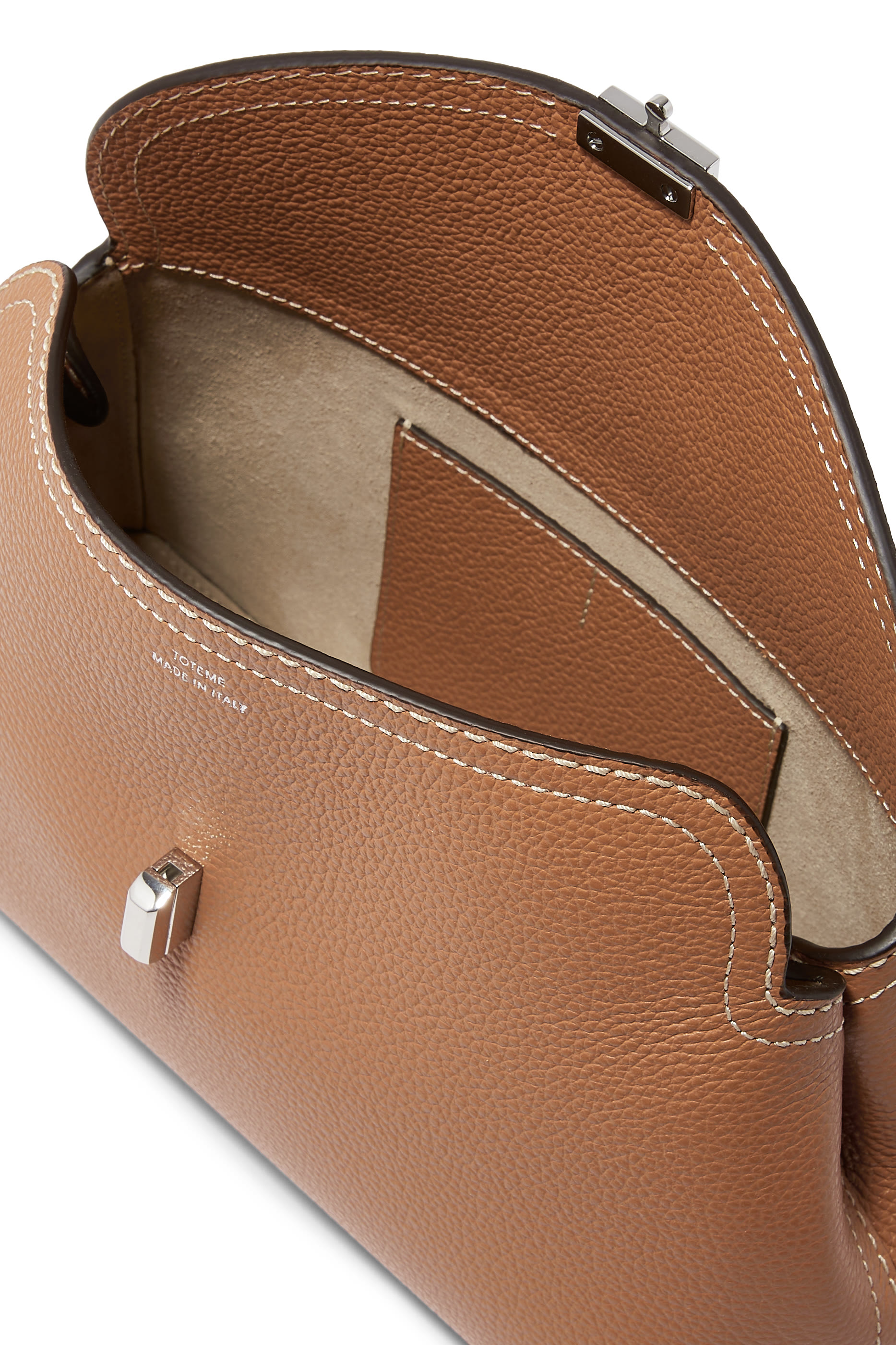 حقيبة كلاتش بقفل على شكل حرف T جلد بارز الملمس