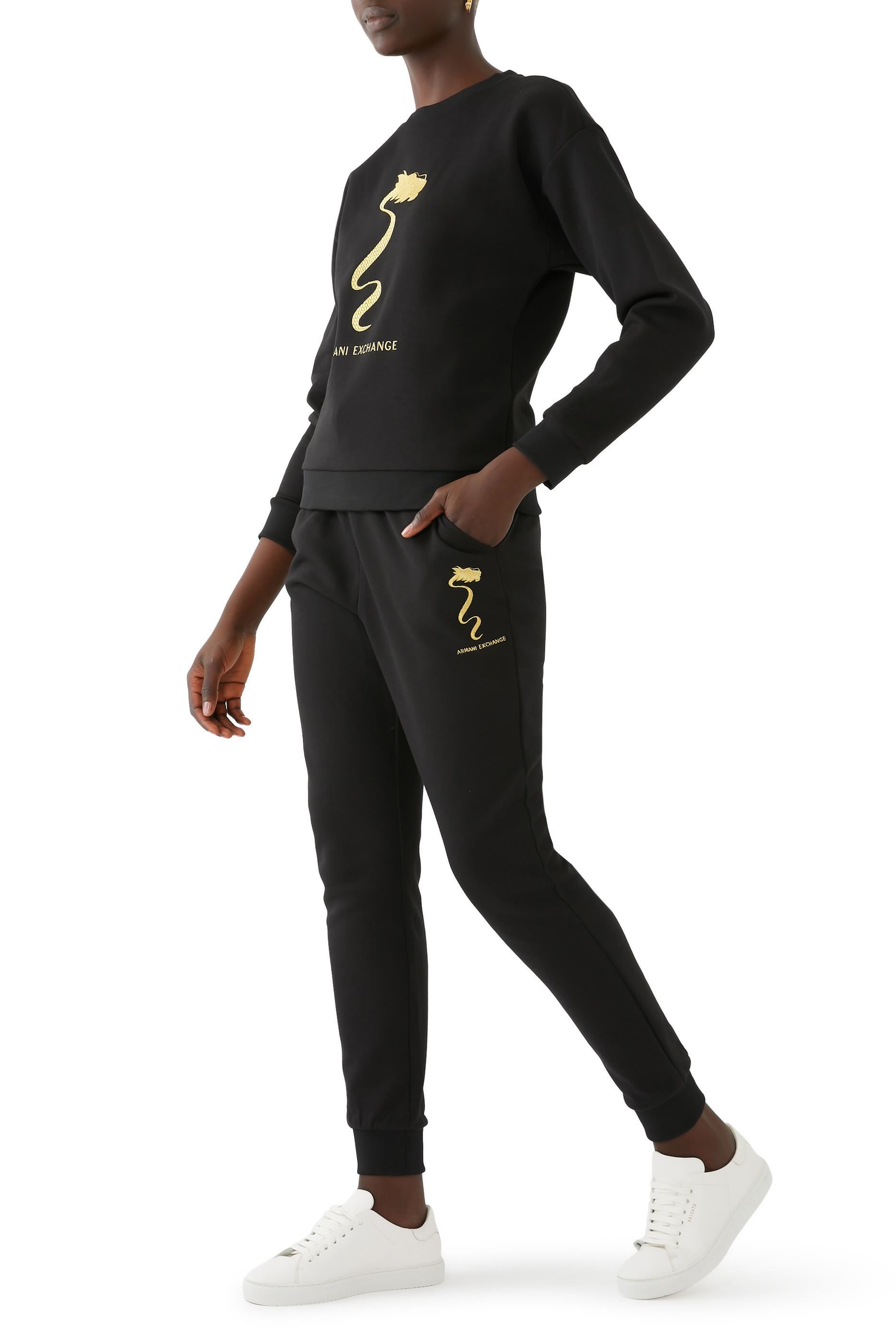 بنطال رياضي بحروف شعار الماركة بإصدار للسنة الصينية الجديدة