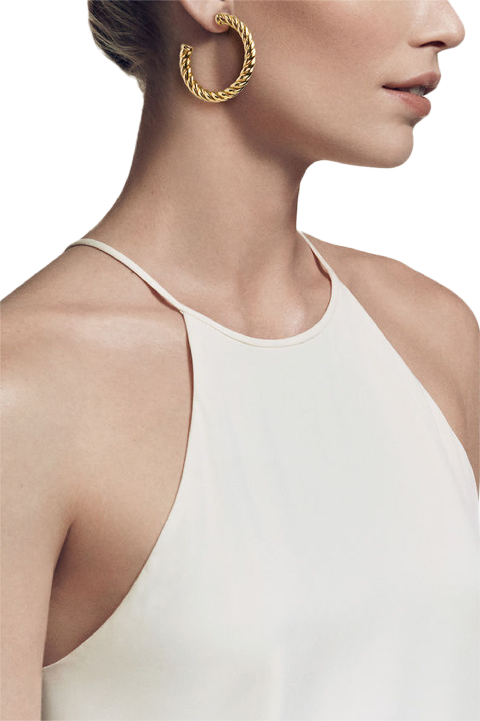 أقراط دائرية سكلبتد كابل ذهب أصفر عيار 18