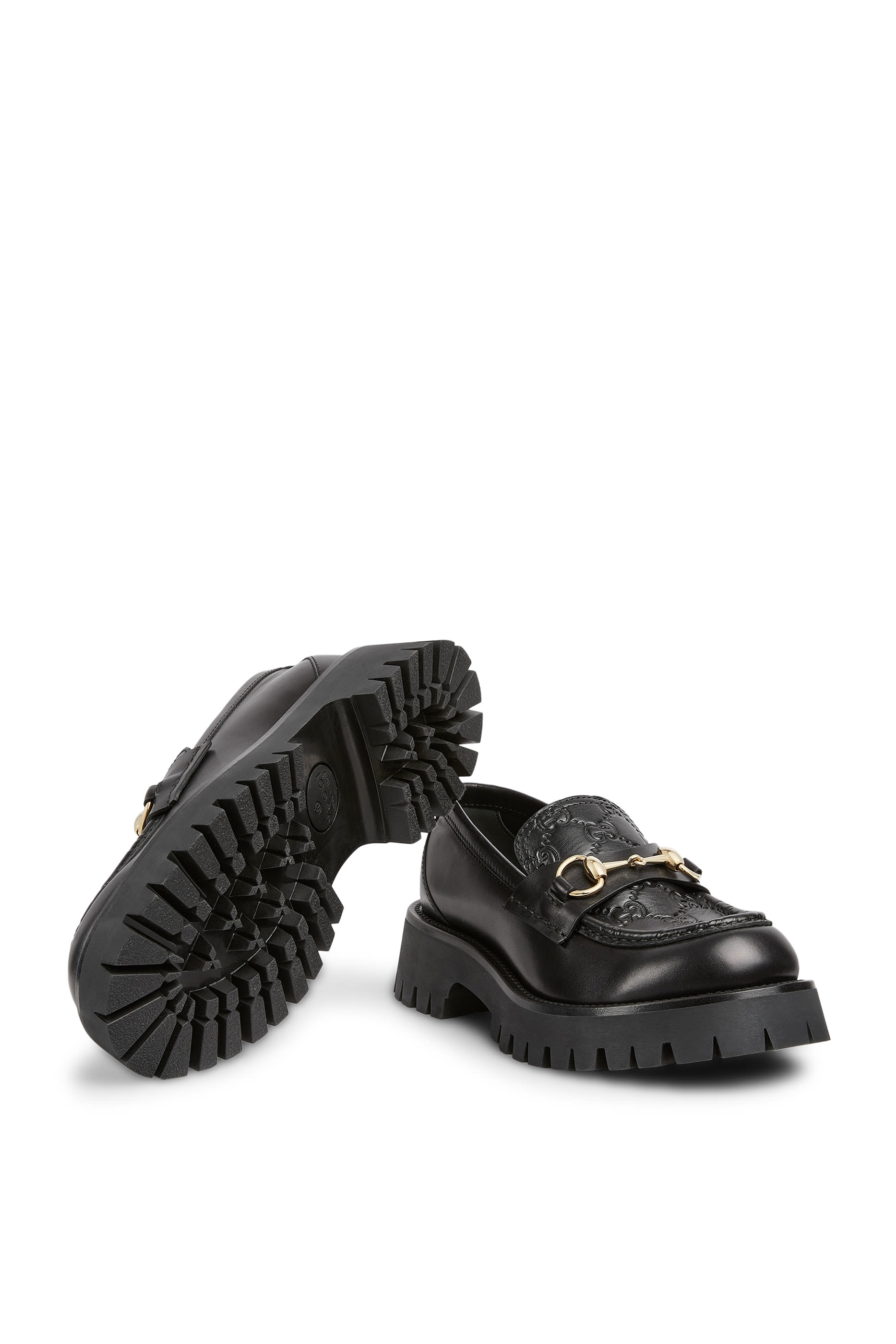 حذاء سهل الإرتداء بنعل سميك وحلية شعار الماركة