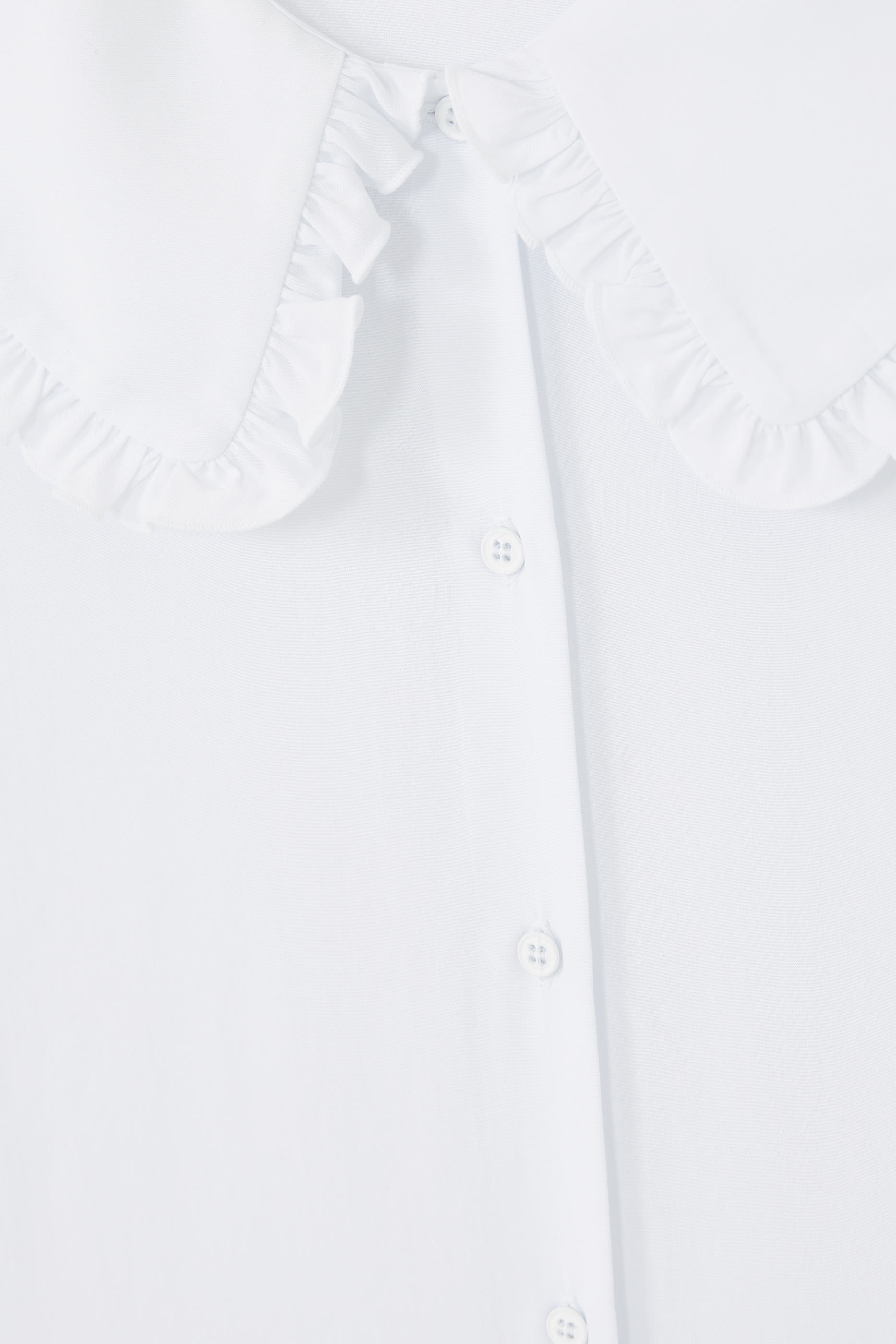 قميص مزين بكشكش للأطفال