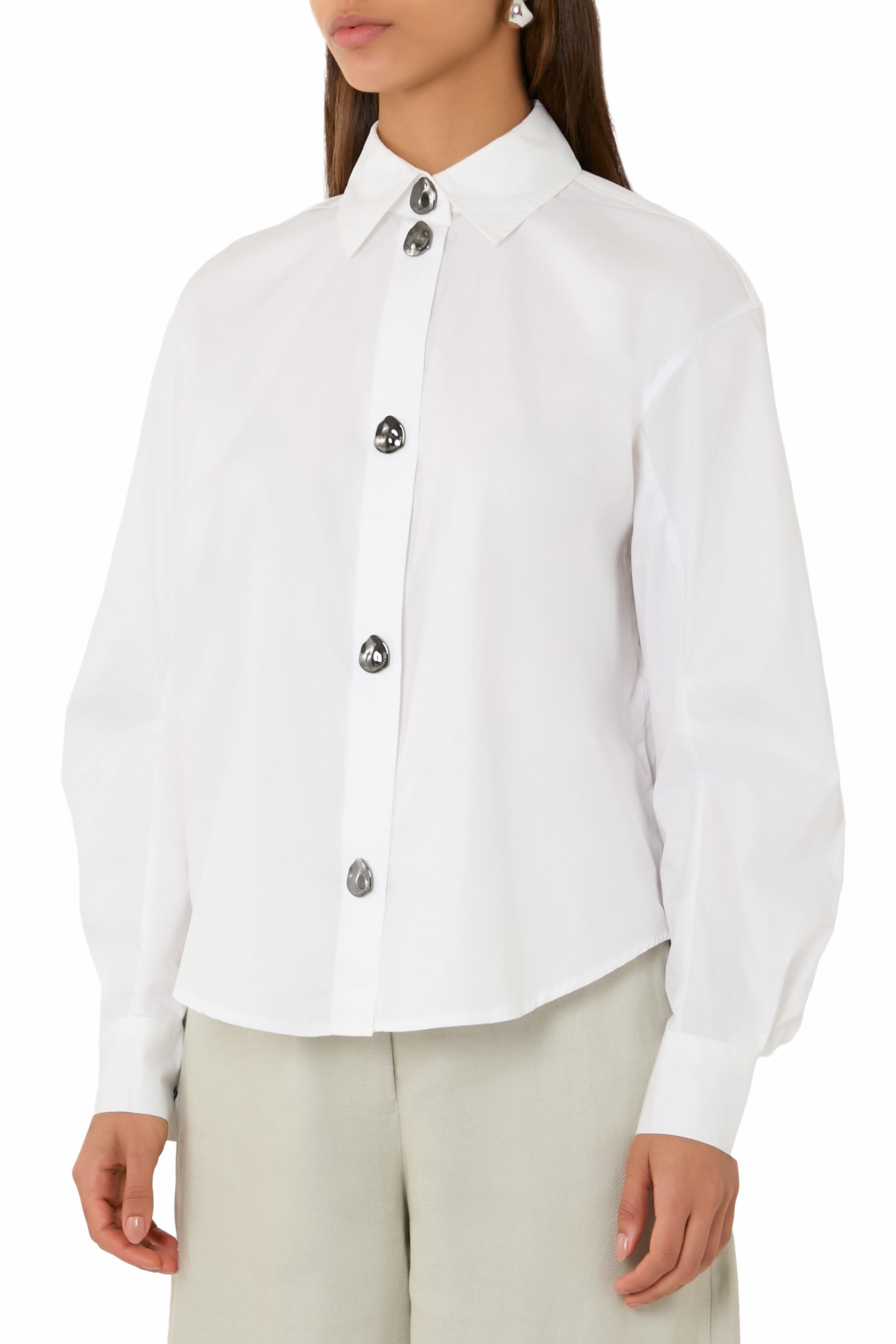 قميص بأكمام طويلة ضيقة