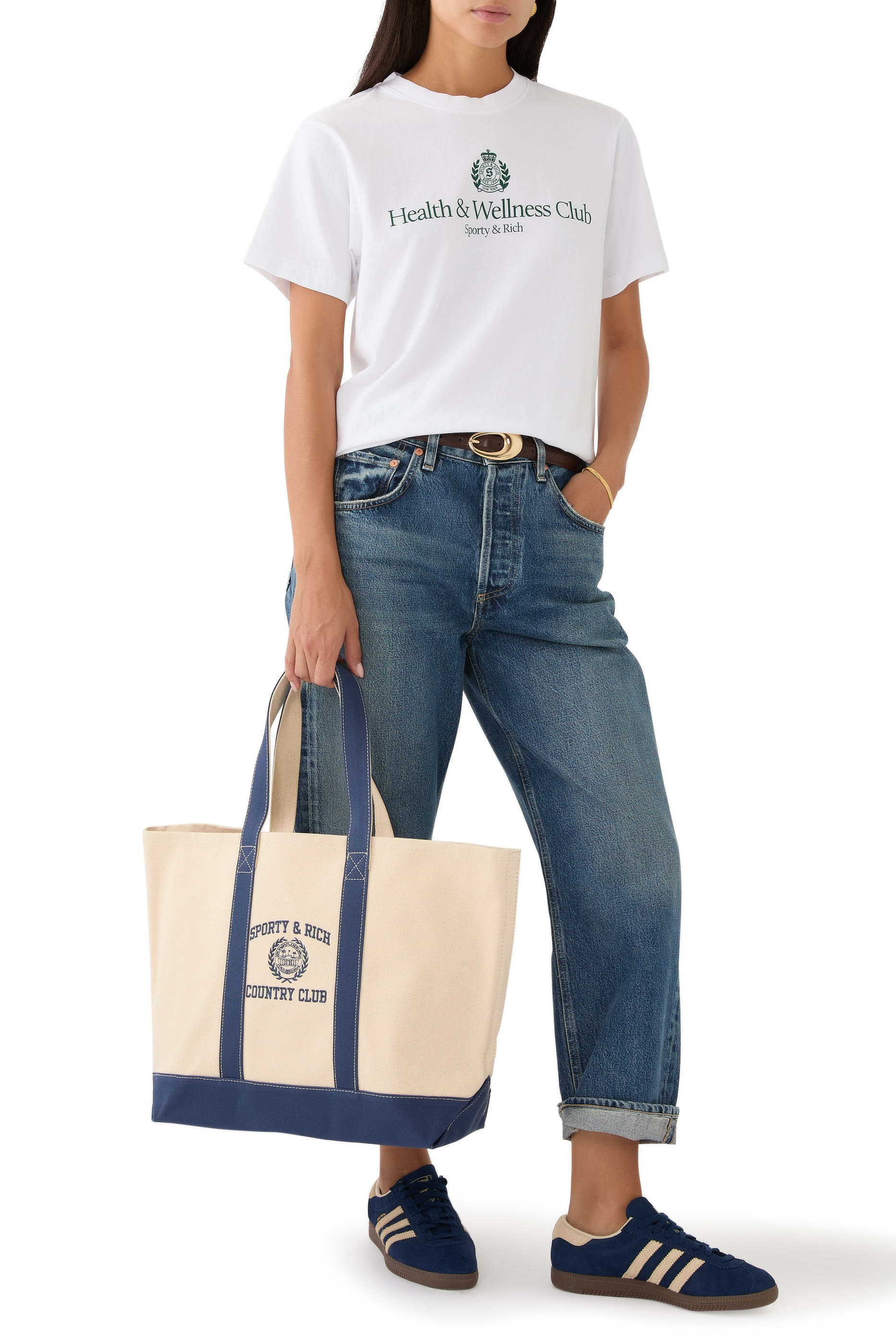 حقيبة يد بلونين ونقشة شعار الماركة بتصميم جامعي