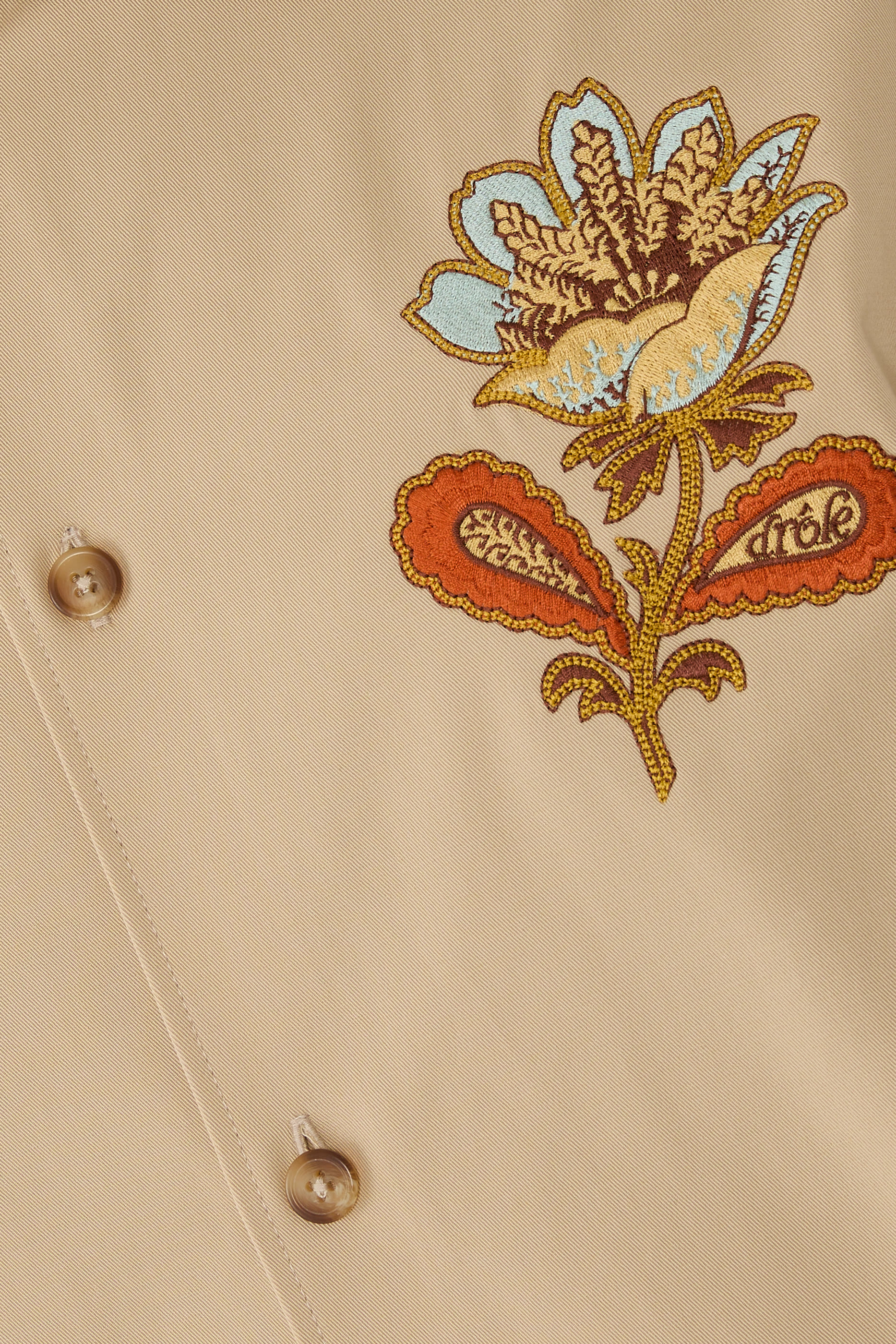 قميص بنمط جاكيت بزهور مطرزة