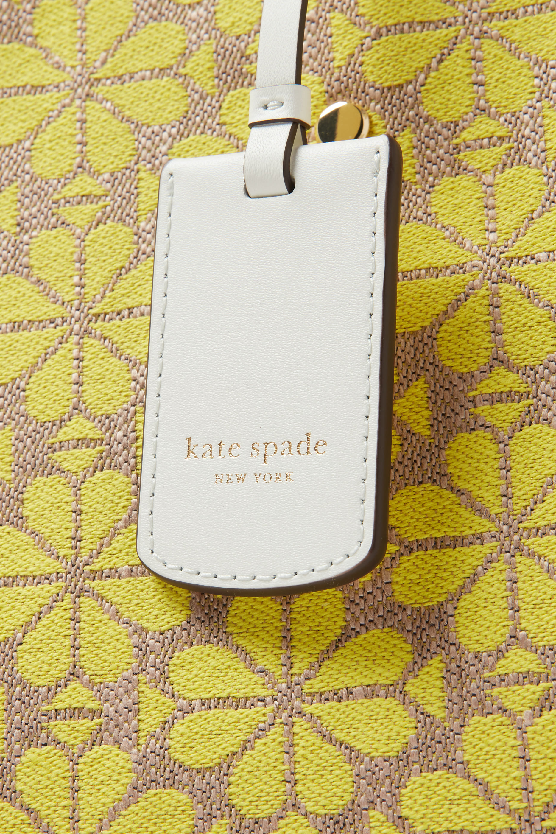 حقيبة يد متوسطة بنقشة زهور بالشكل البستوني