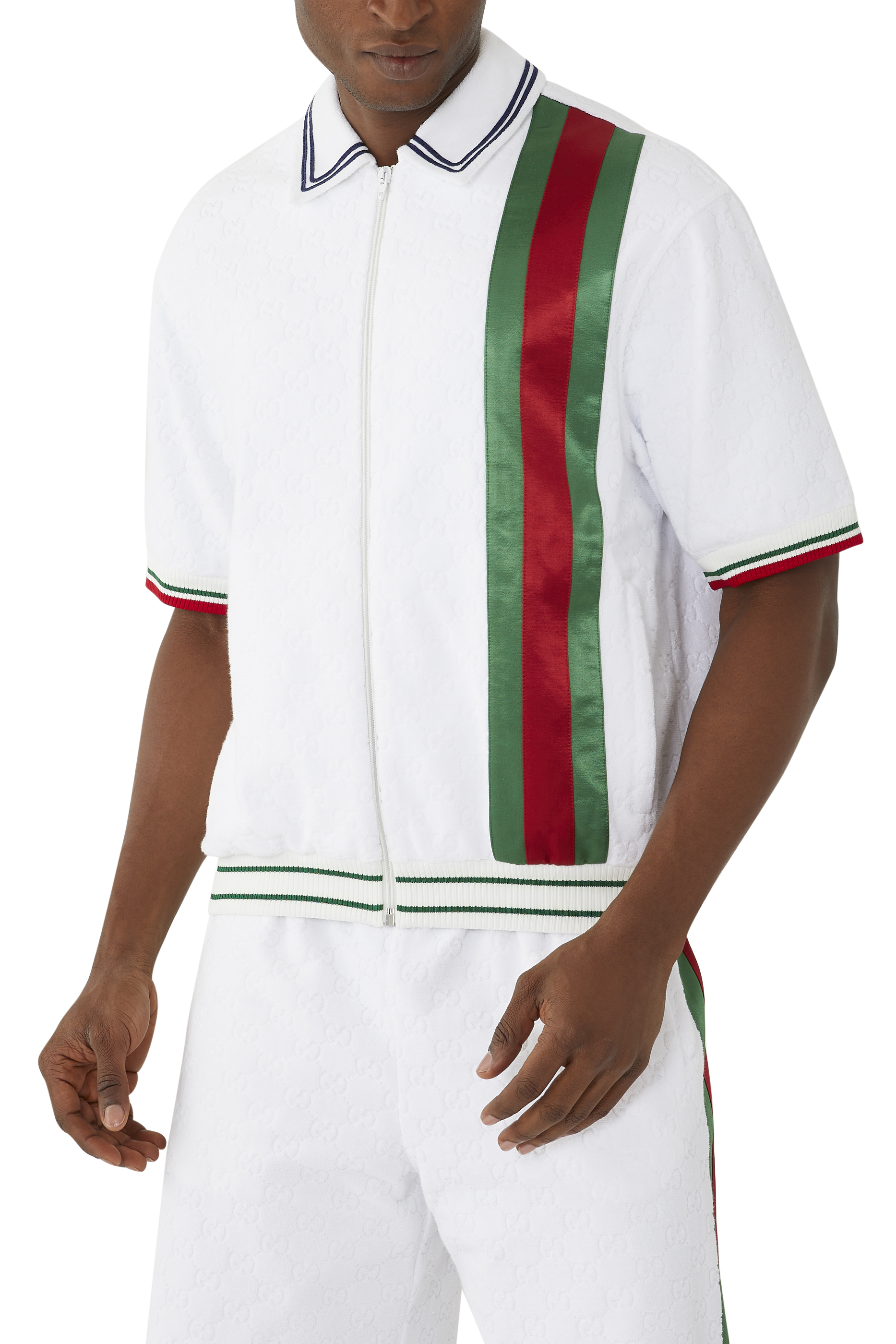 قميص بولو بشريط ويأبيض