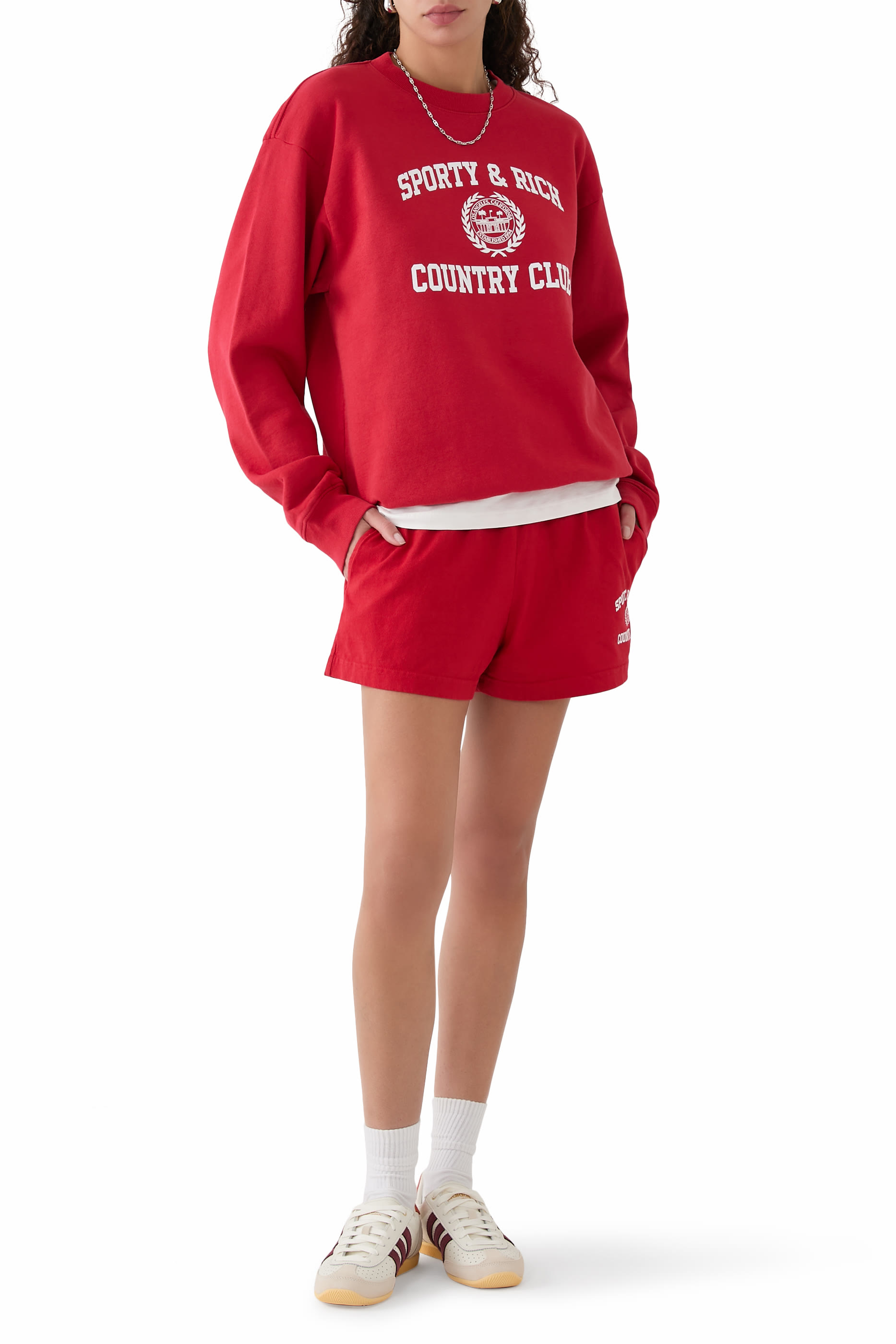 سويت شيرت بياقة ضيقة ونقشة شعار الماركة بتصميم جامعي