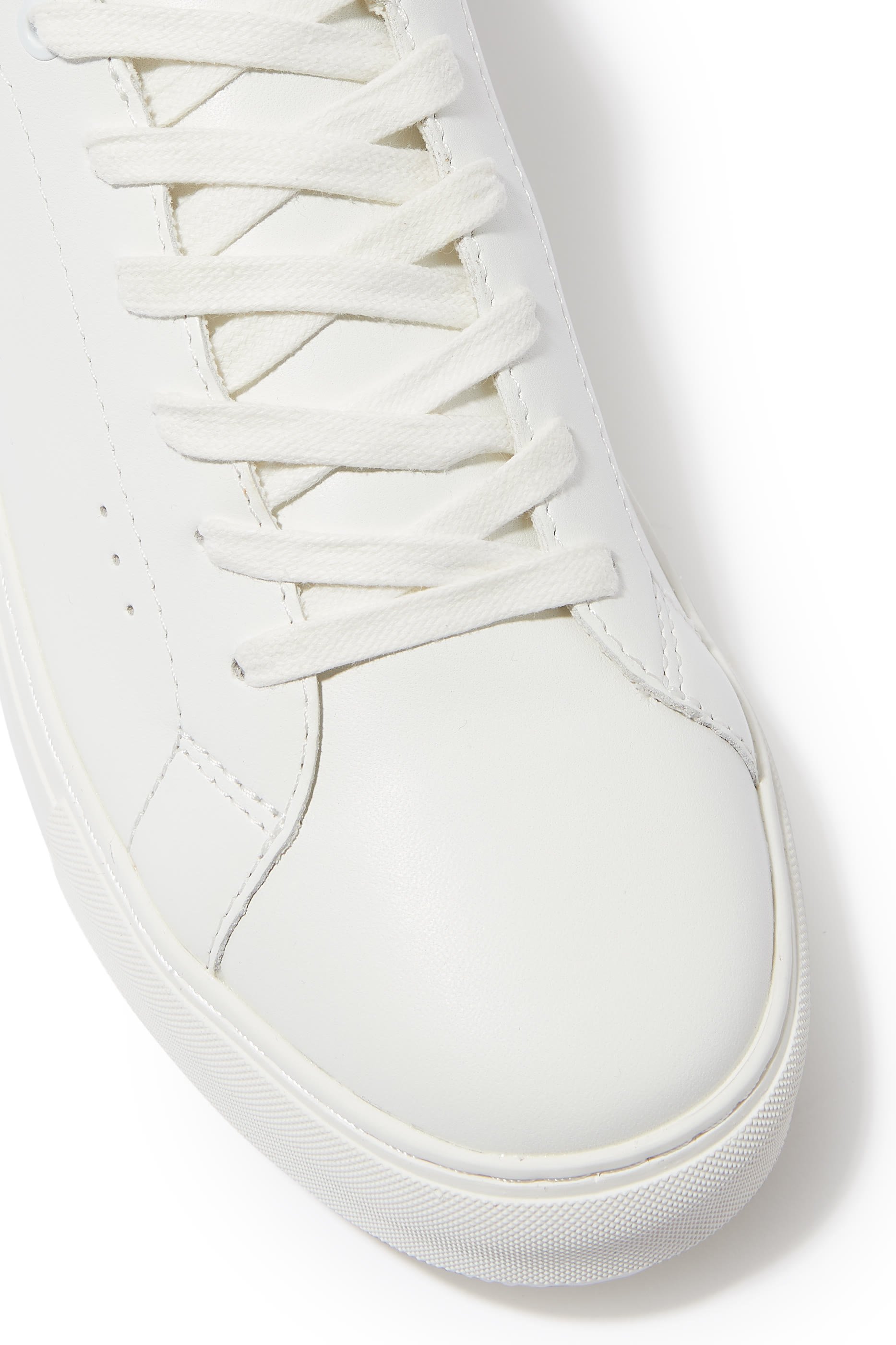 سنيكرز ليني جلد بنعل سميك وحلية نسر