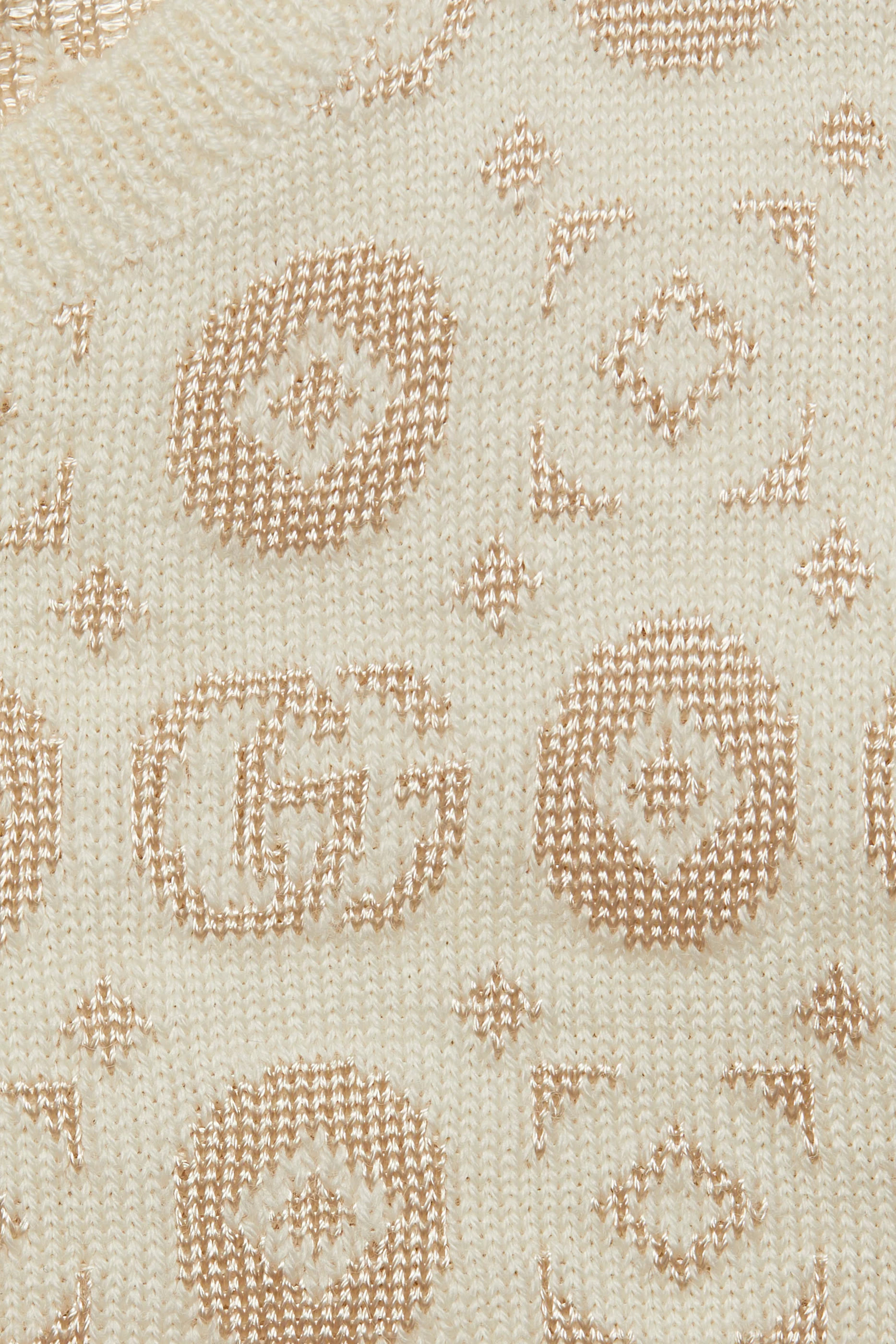 فستان للأطفال بنقشة هندسية بحرفي شعار الماركة صوف