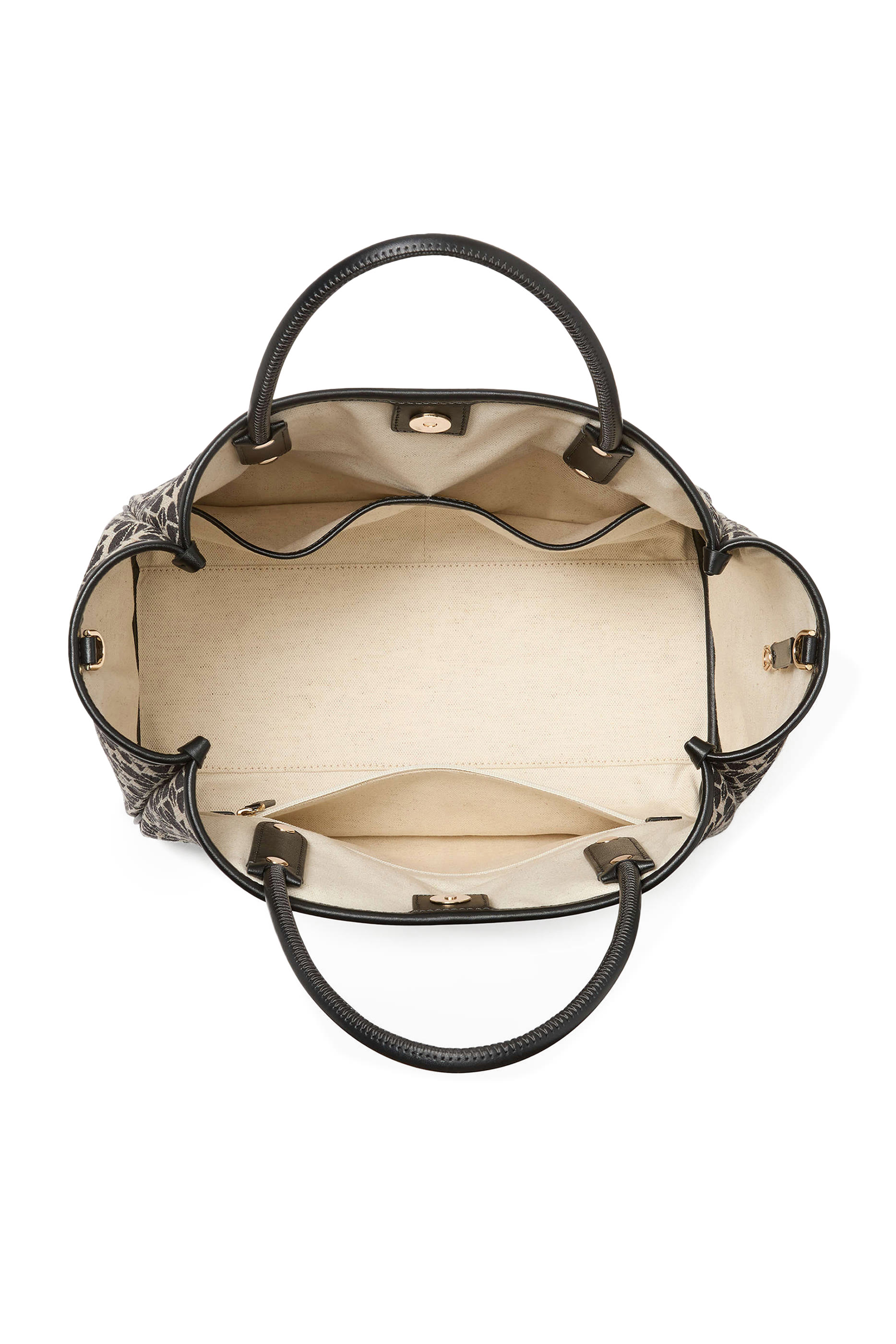 حقيبة يد متوسطة بنقشة زهور بالشكل البستوني