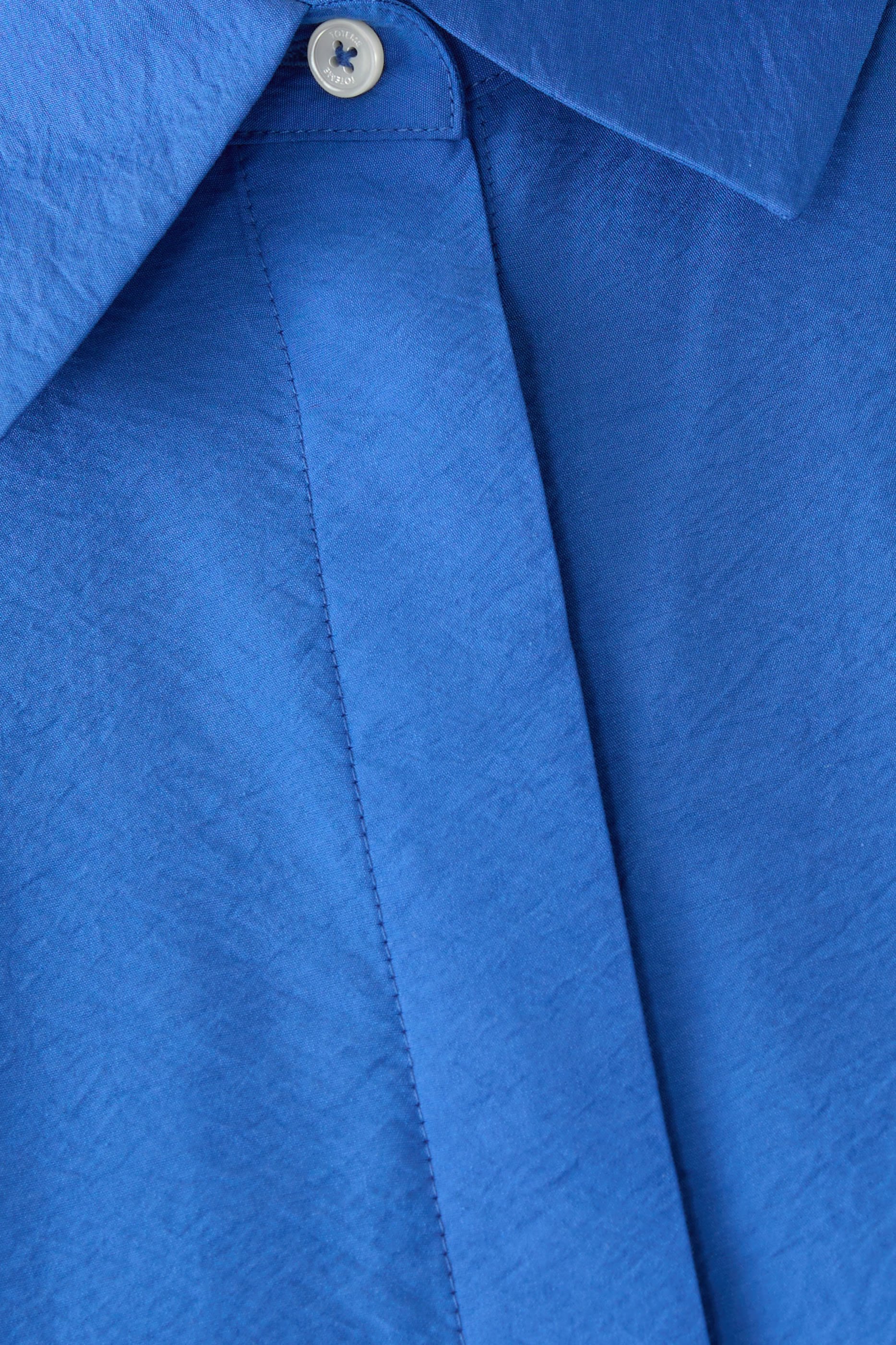 فستان بتصميم قميص بقصة واسعة