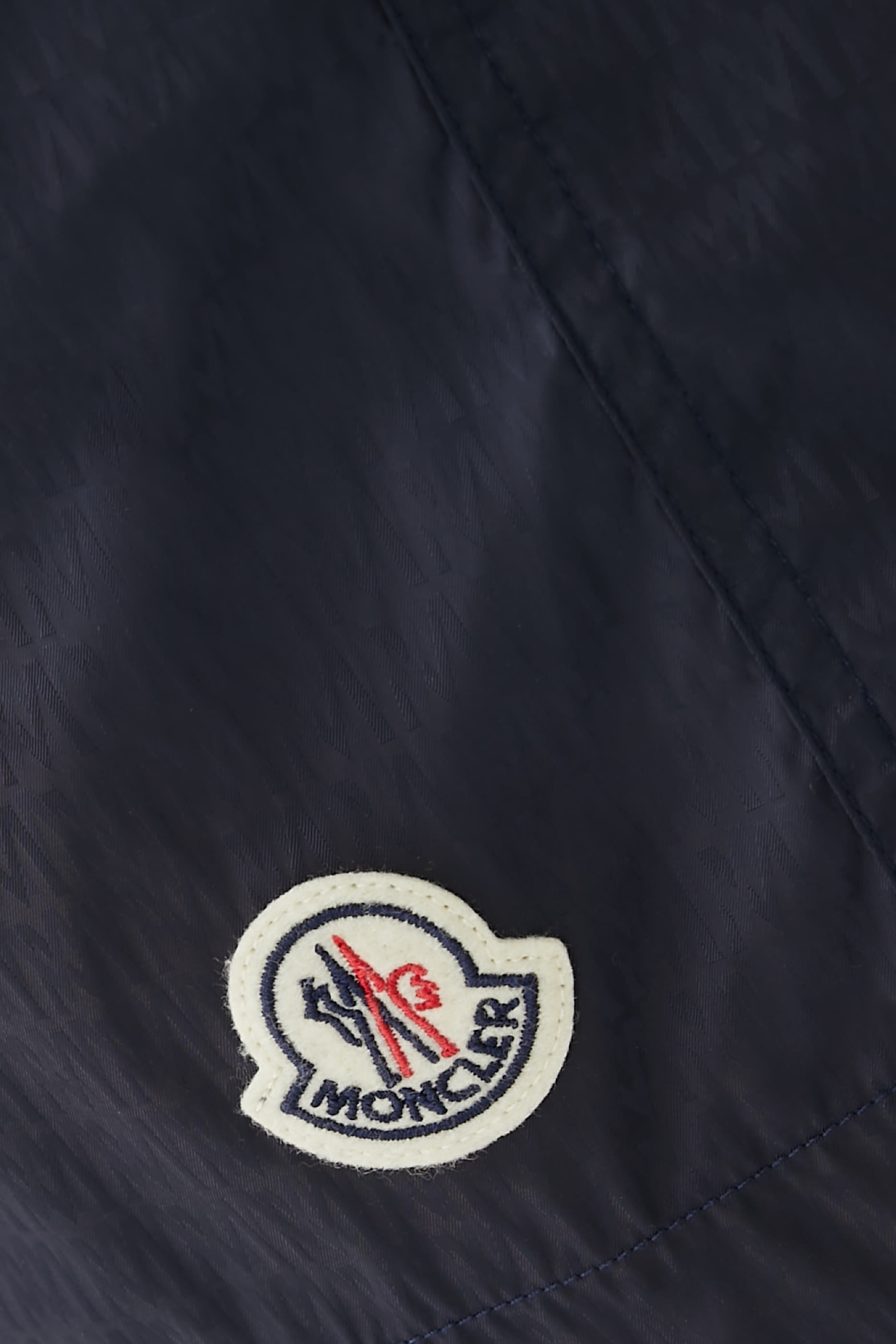 شورت سباحة بشعار الماركة