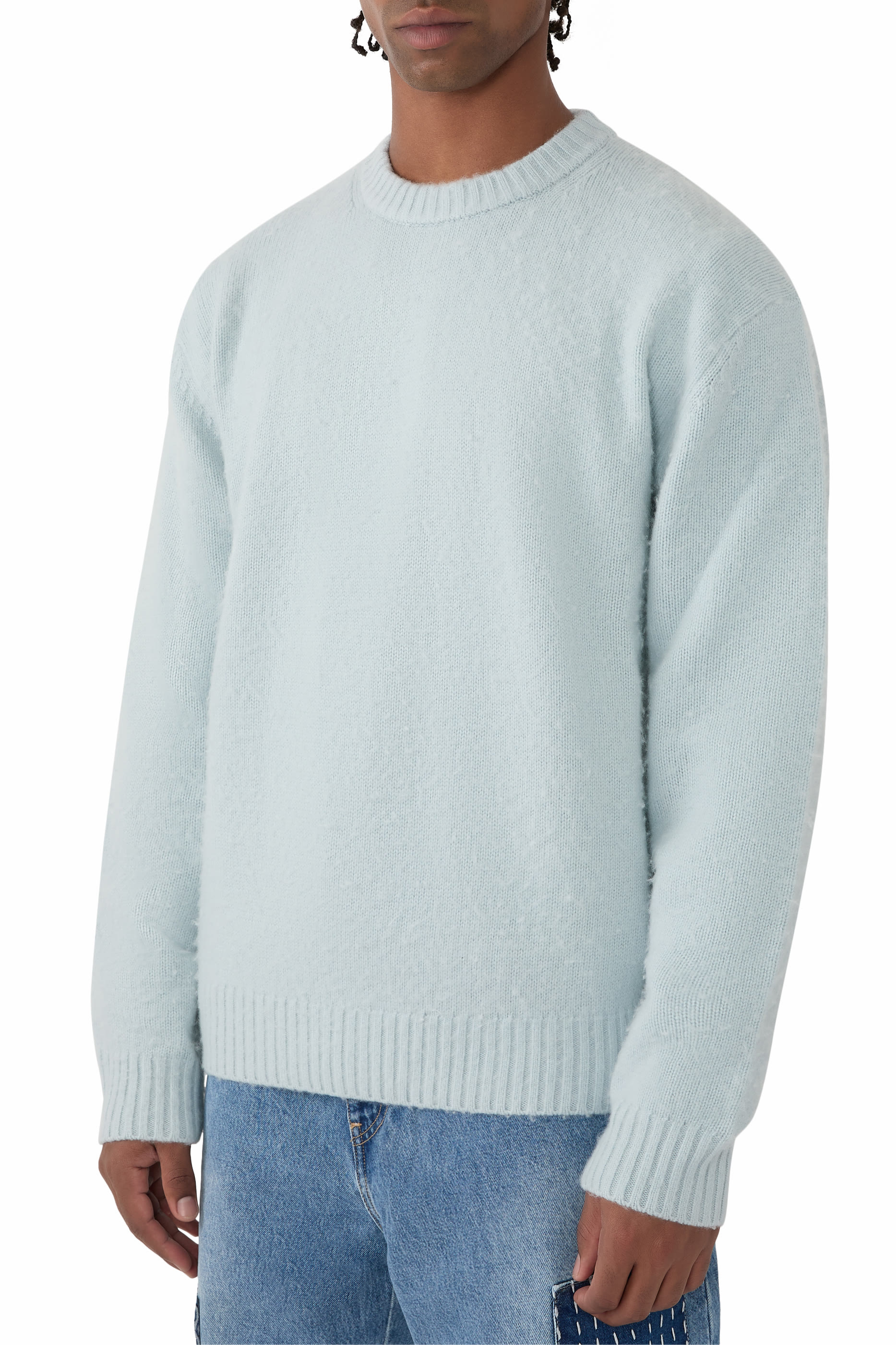 كنزة برقعة شعار الماركة