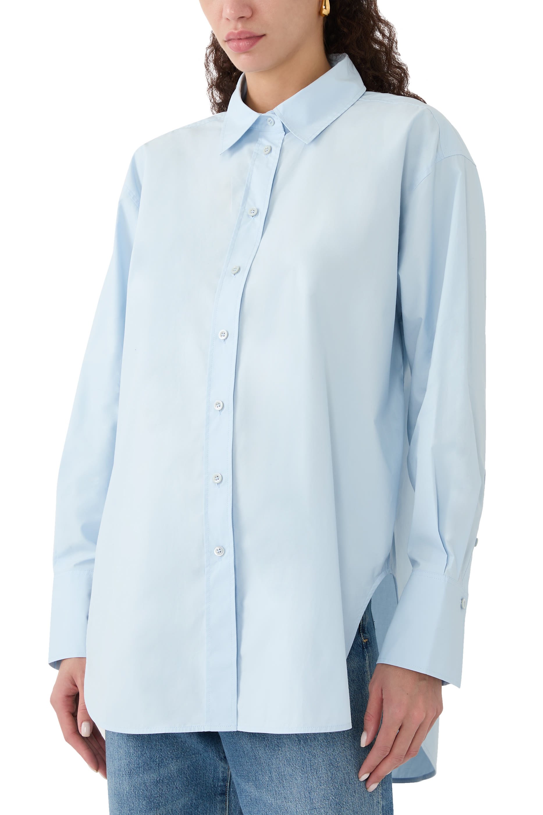 قميص بقصة فضفاضة