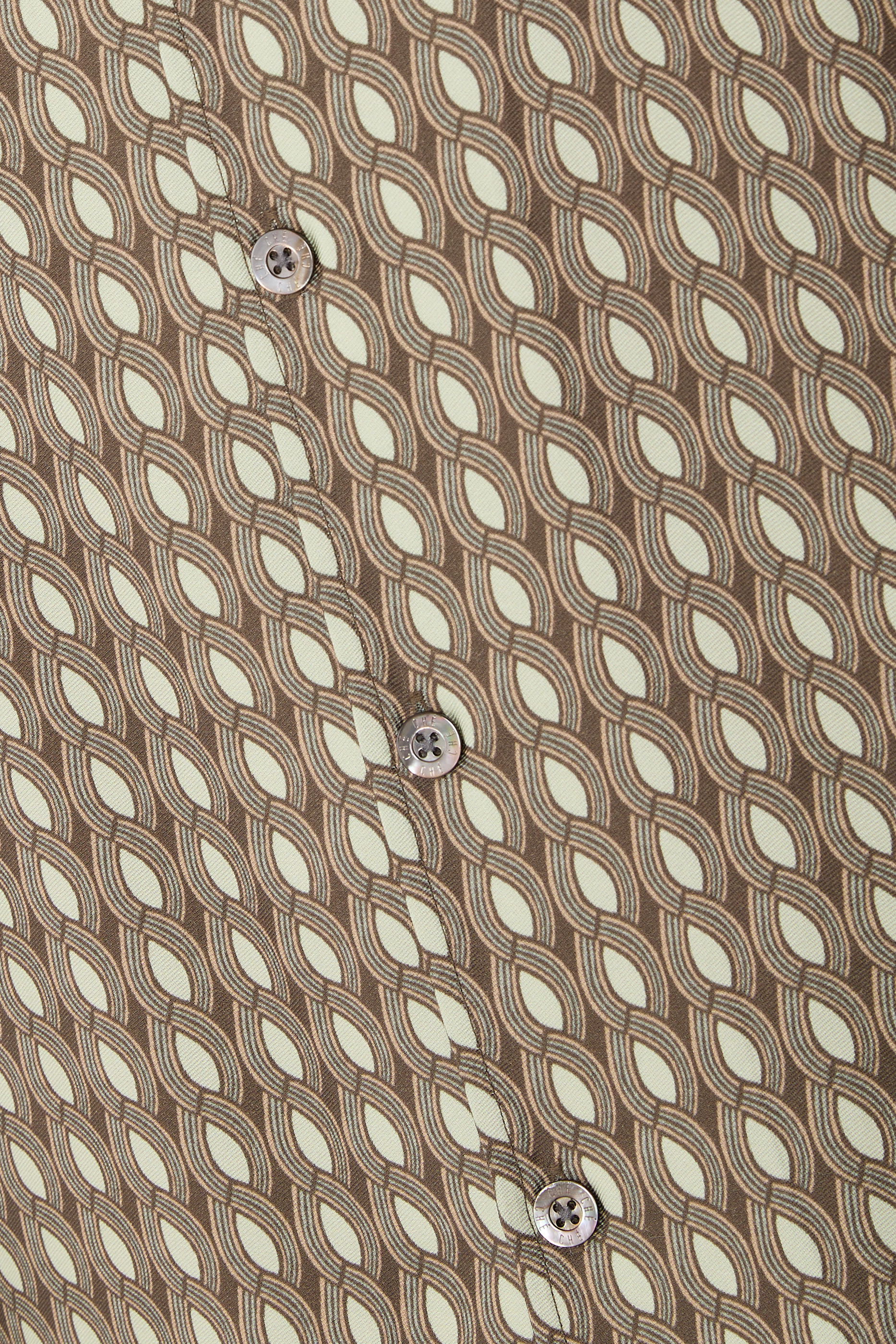 قميص بأكمام طويلة ونقشة مونيتو