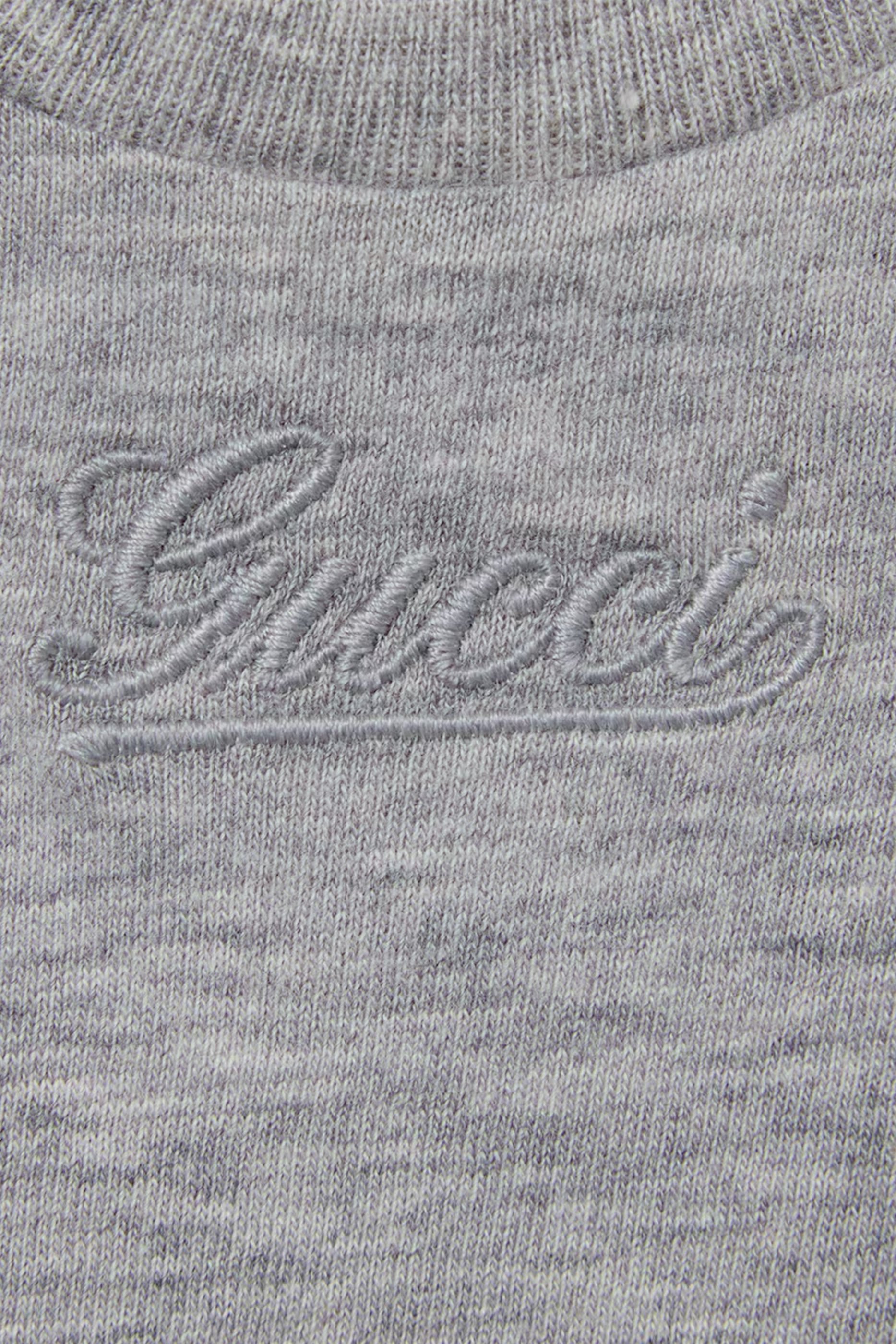 تيشيرت بتطريز شعار الماركة قطن للرضع