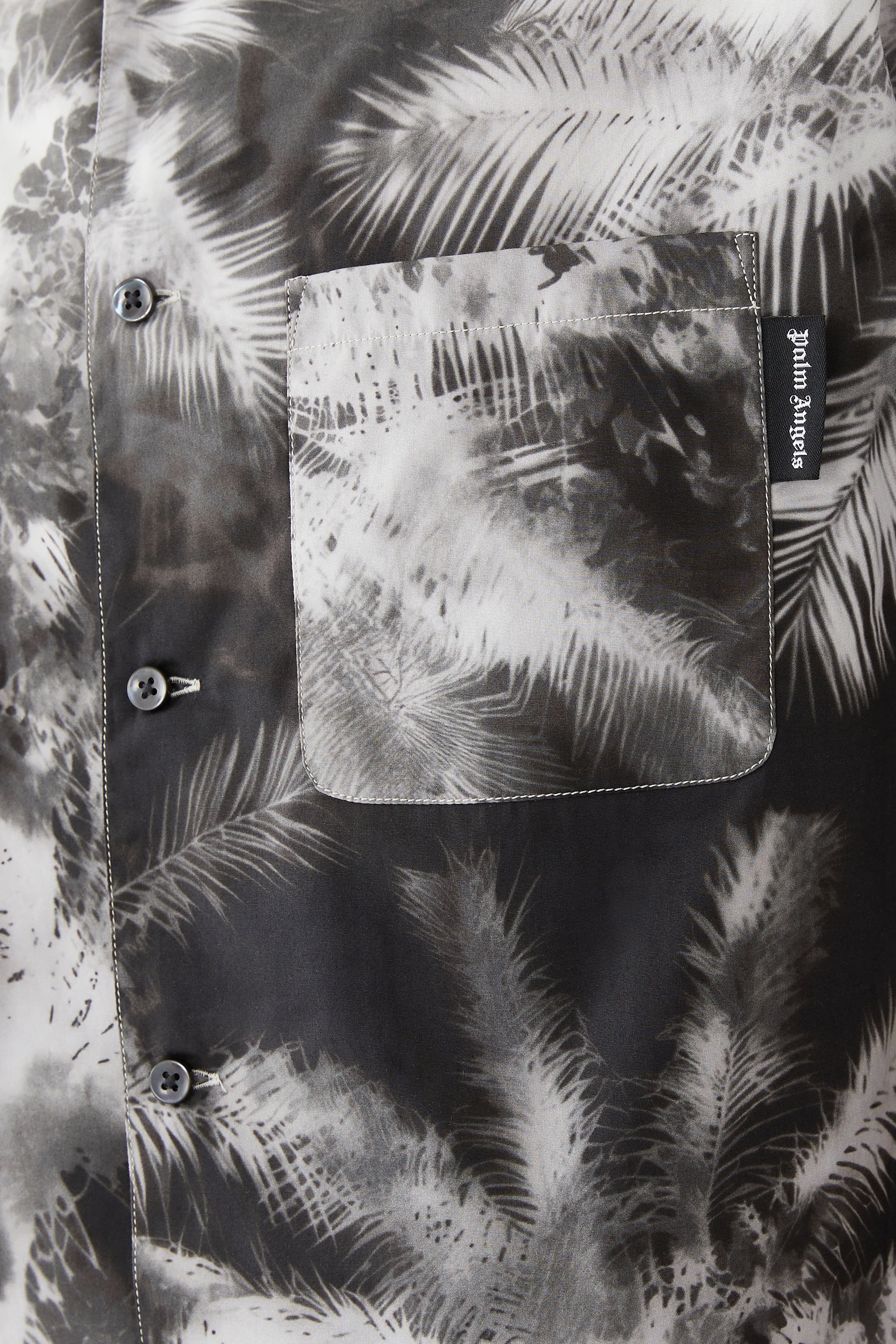 قميص بنقشة نخيل بلون أزرق