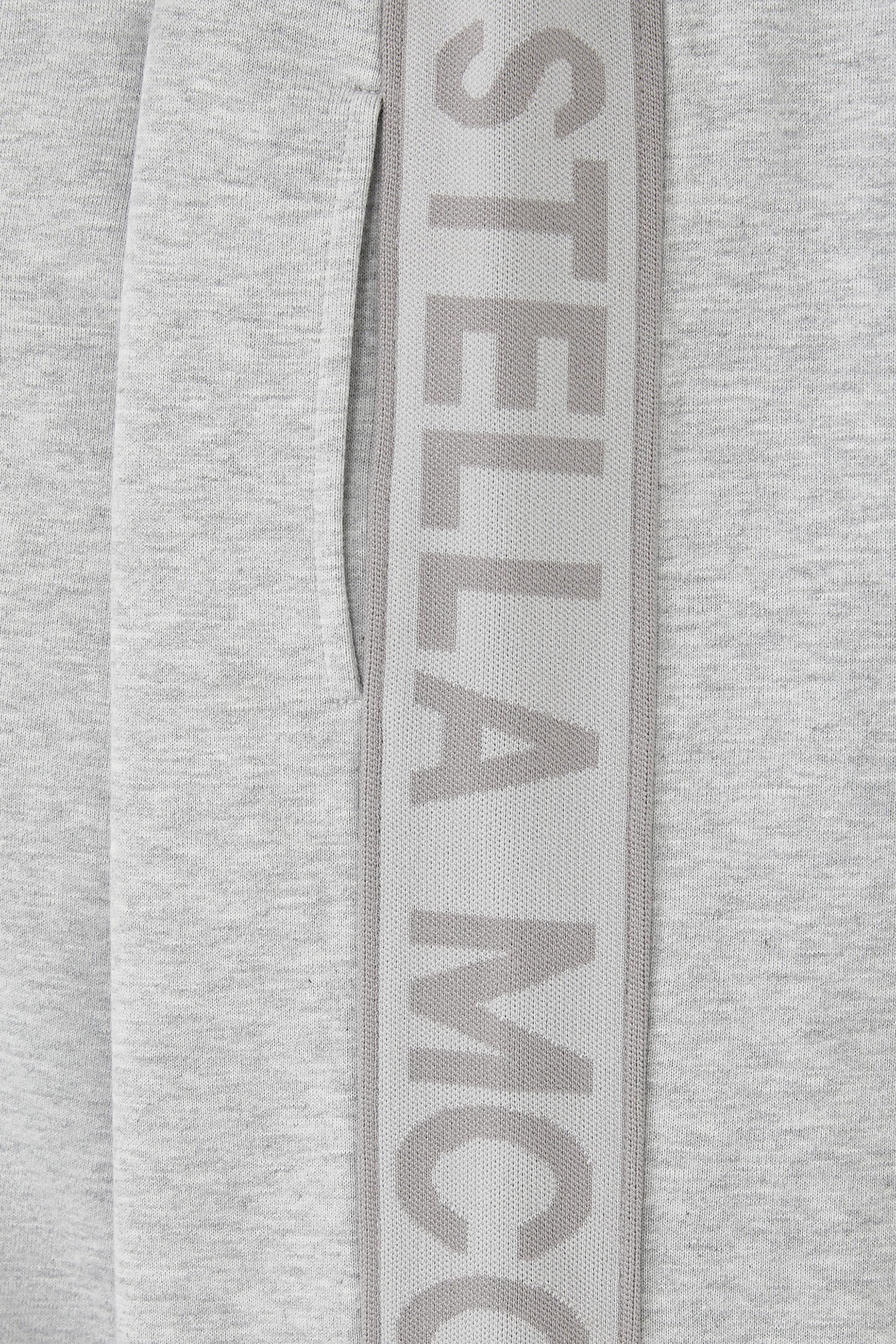 بنطال رياضي بشعار الماركة للأطفال