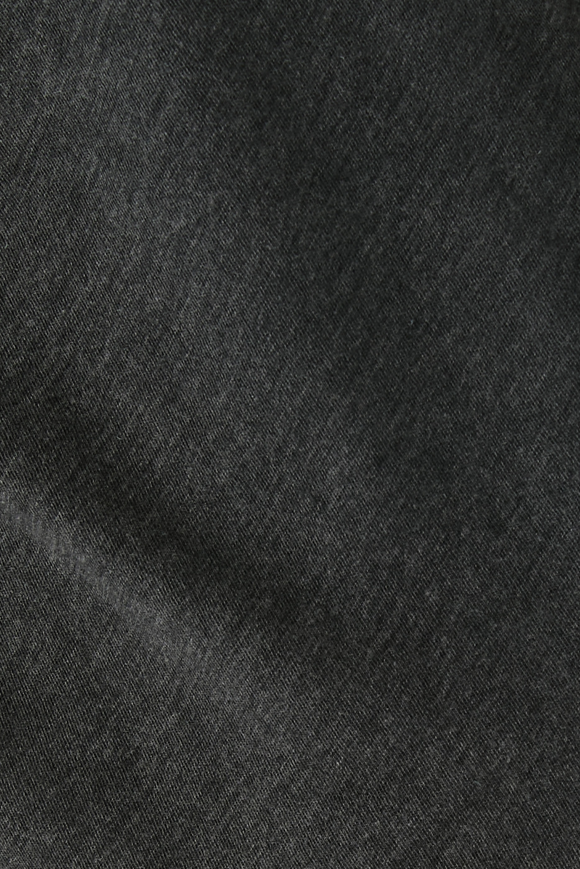 بلوزة شفافة محبوكة بياقة عالية