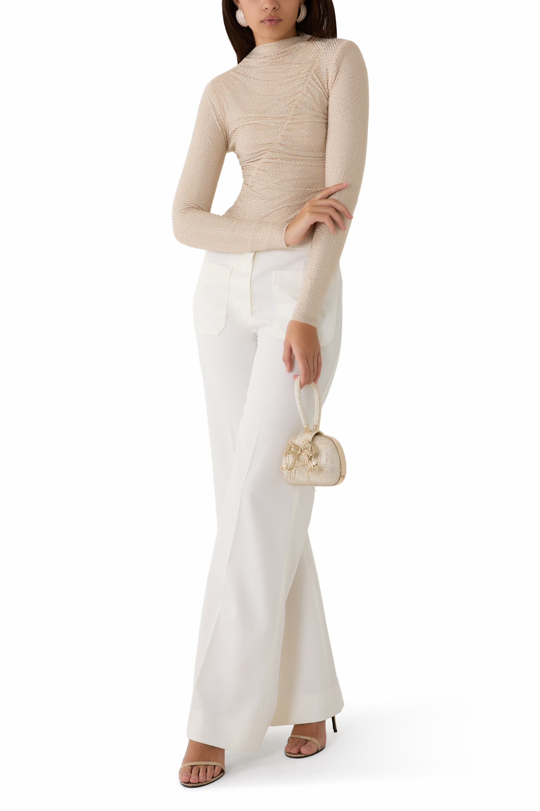 بلوزة مزينة بكشكش مرصعة بأحجار الراين