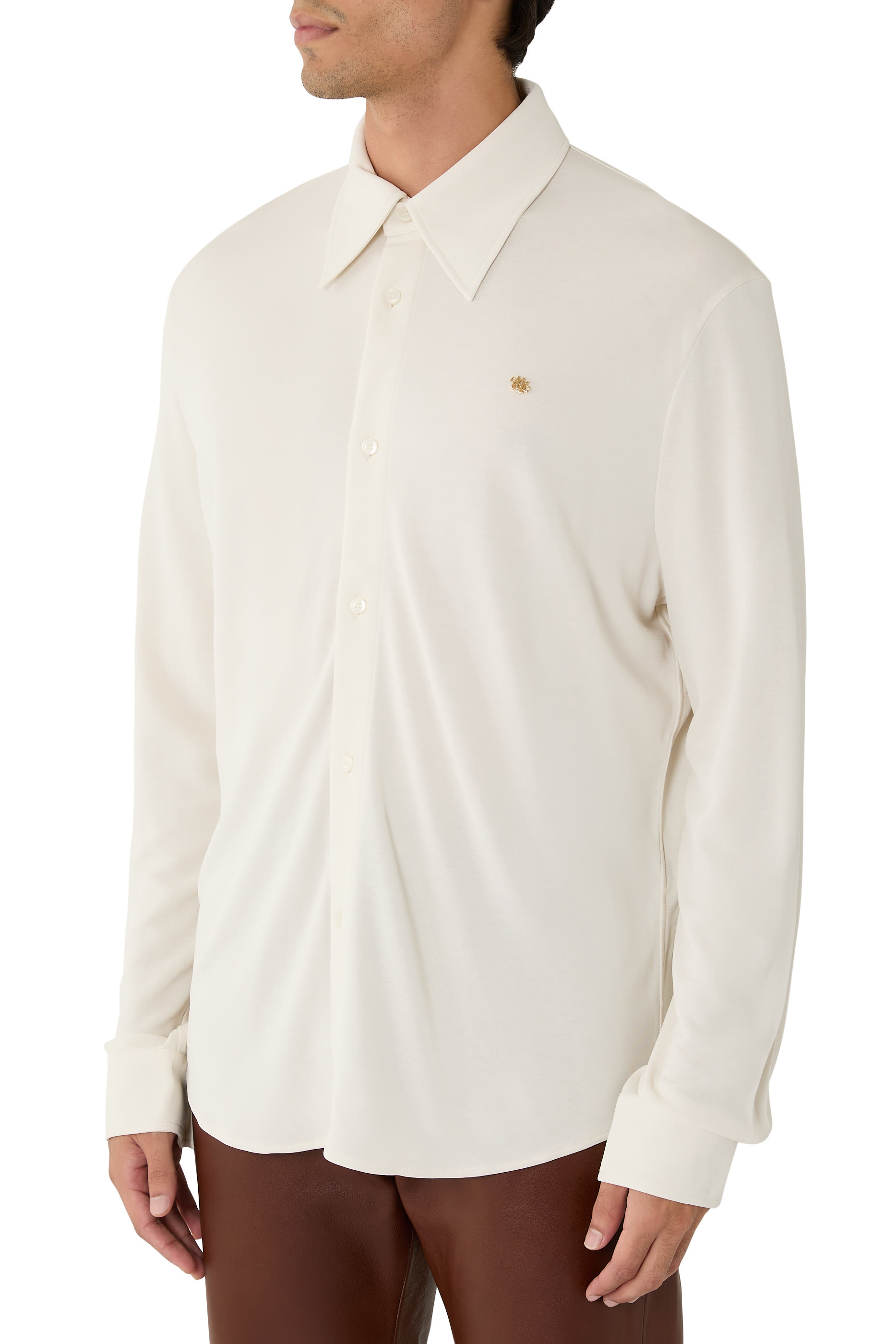 قميص بشعار الماركة وأكمام طويلة