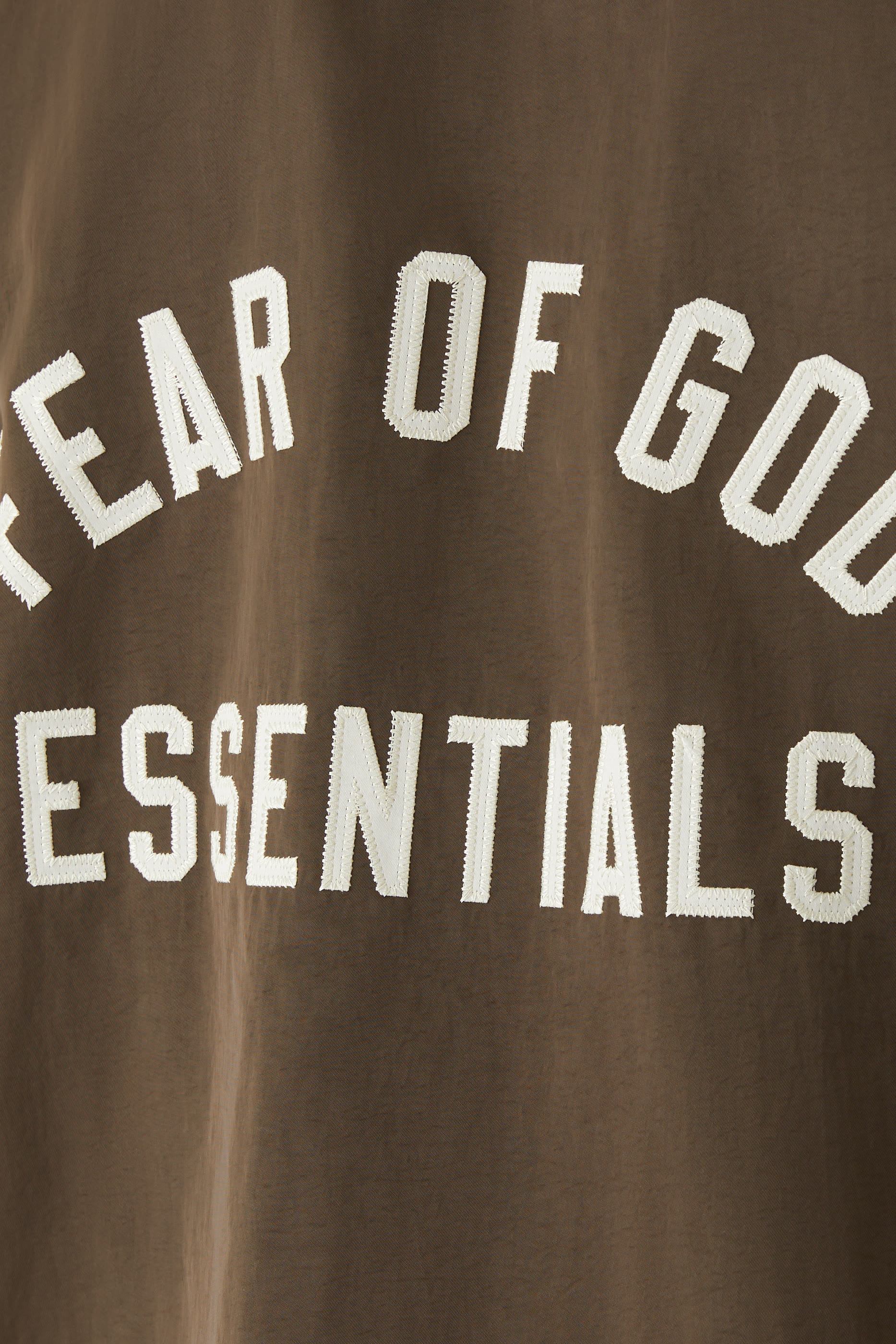 جاكيت كوتشز بغطاء للرأس نايلون بارز الملمس