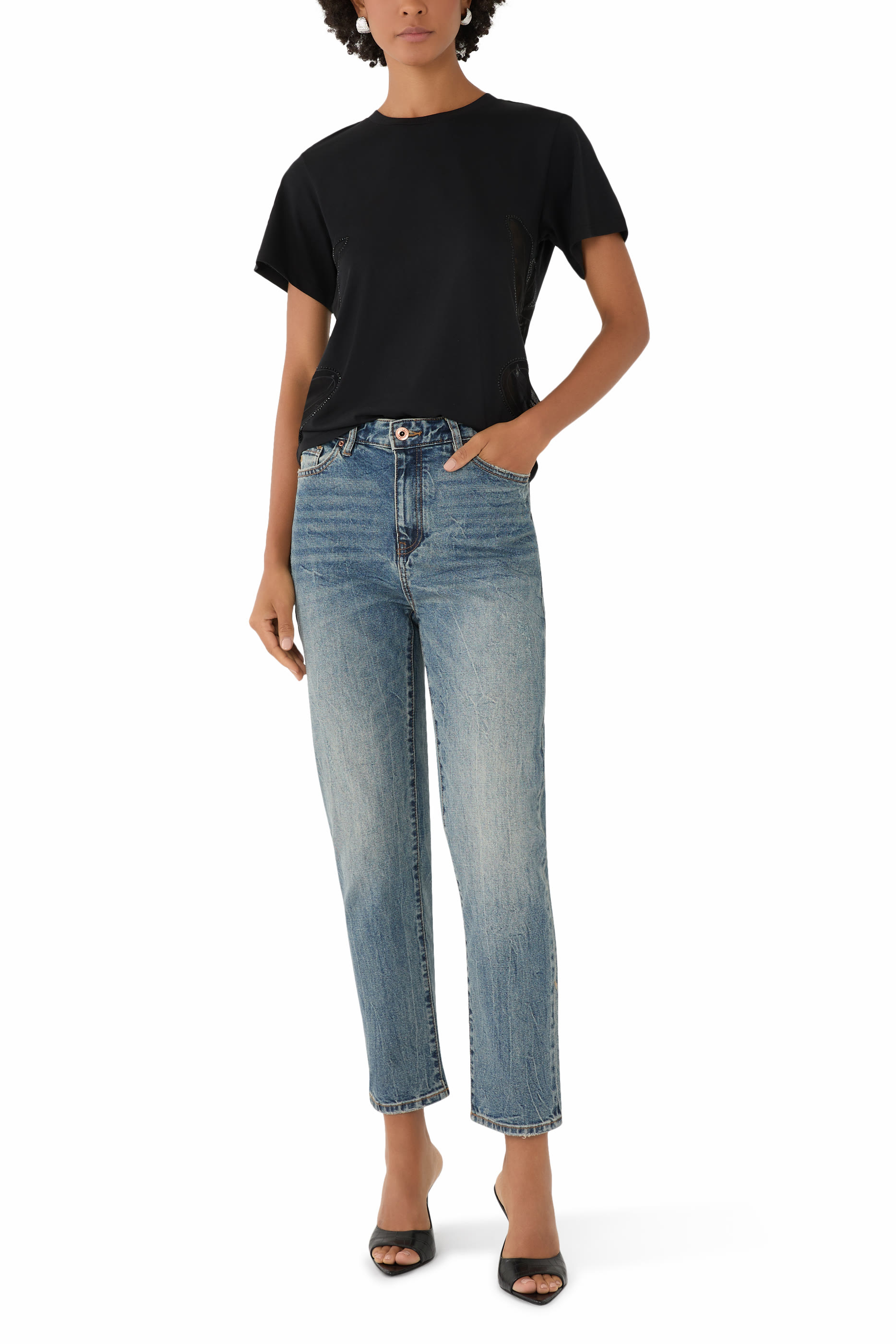 بنطال بقصة ضيقة وخمسة جيوب دنيم