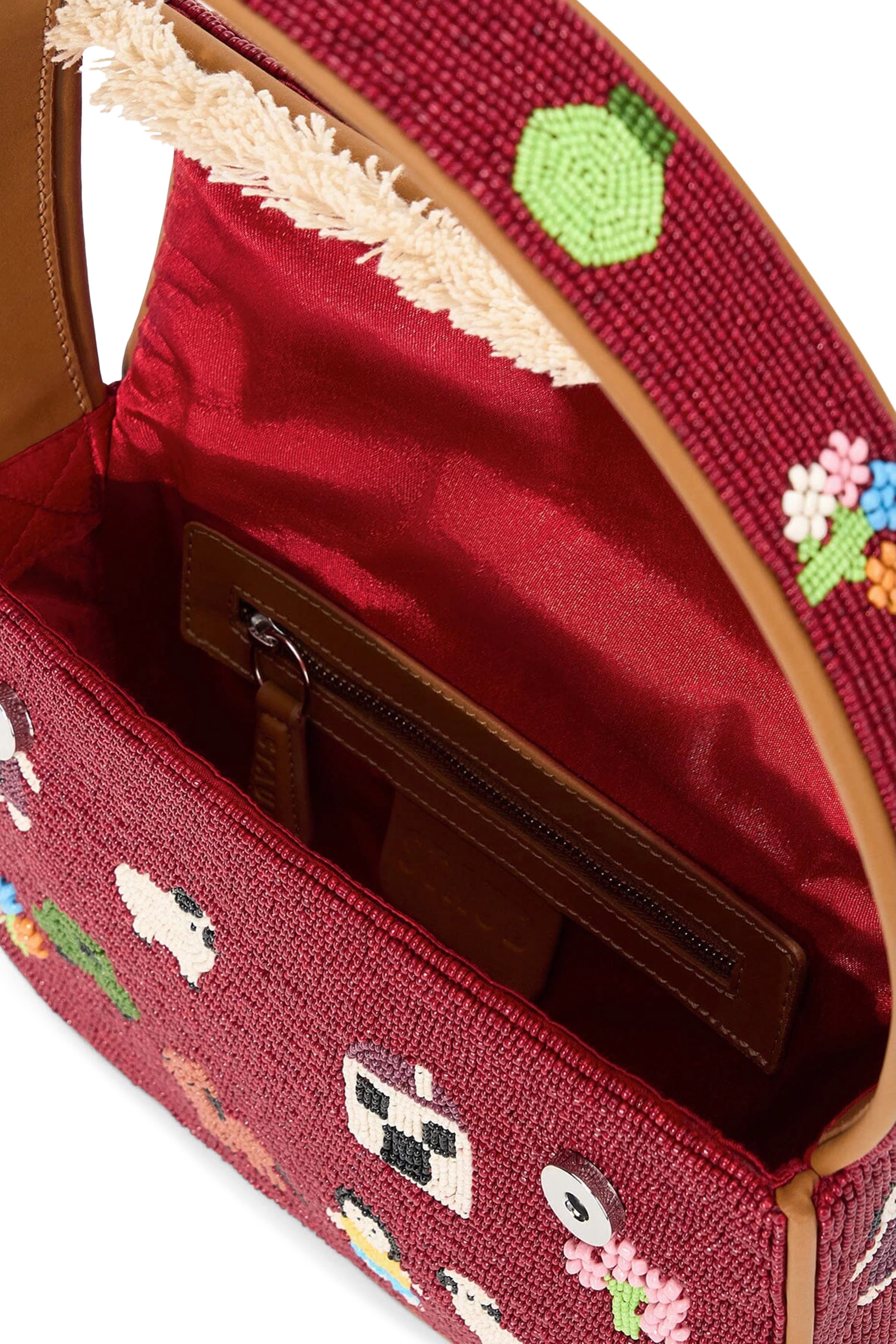 حقيبة تومي مطرزة بخرز