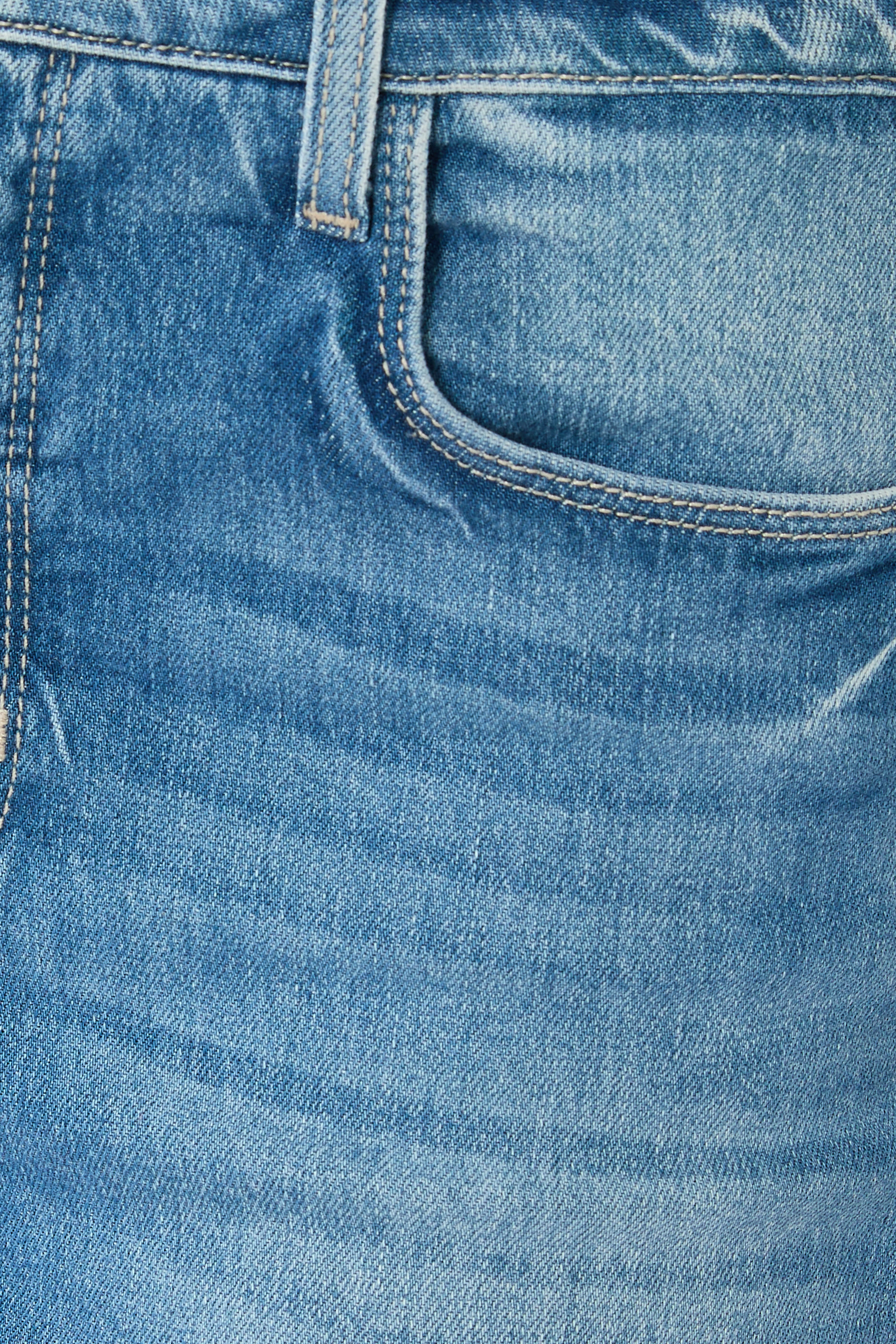 بنطال جينز ميرا بقصة ضيقة قصيرة بحافة واسعة