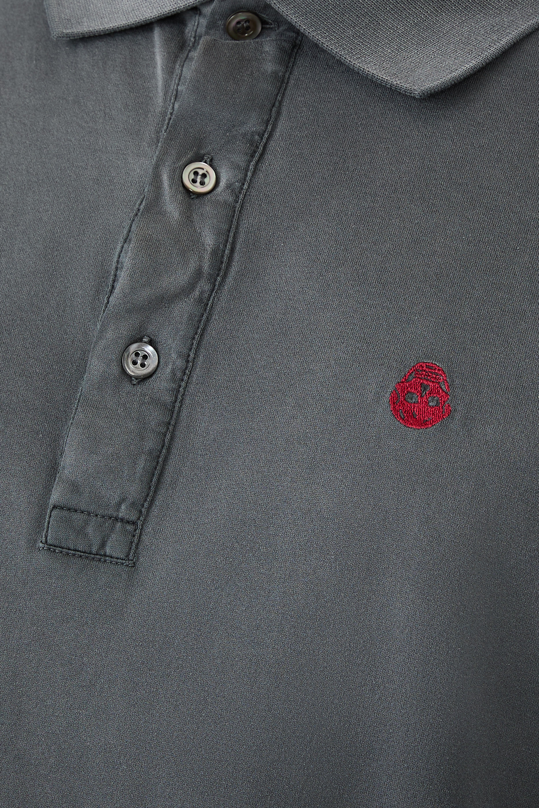 قميص بولو بقصة فضفاضة