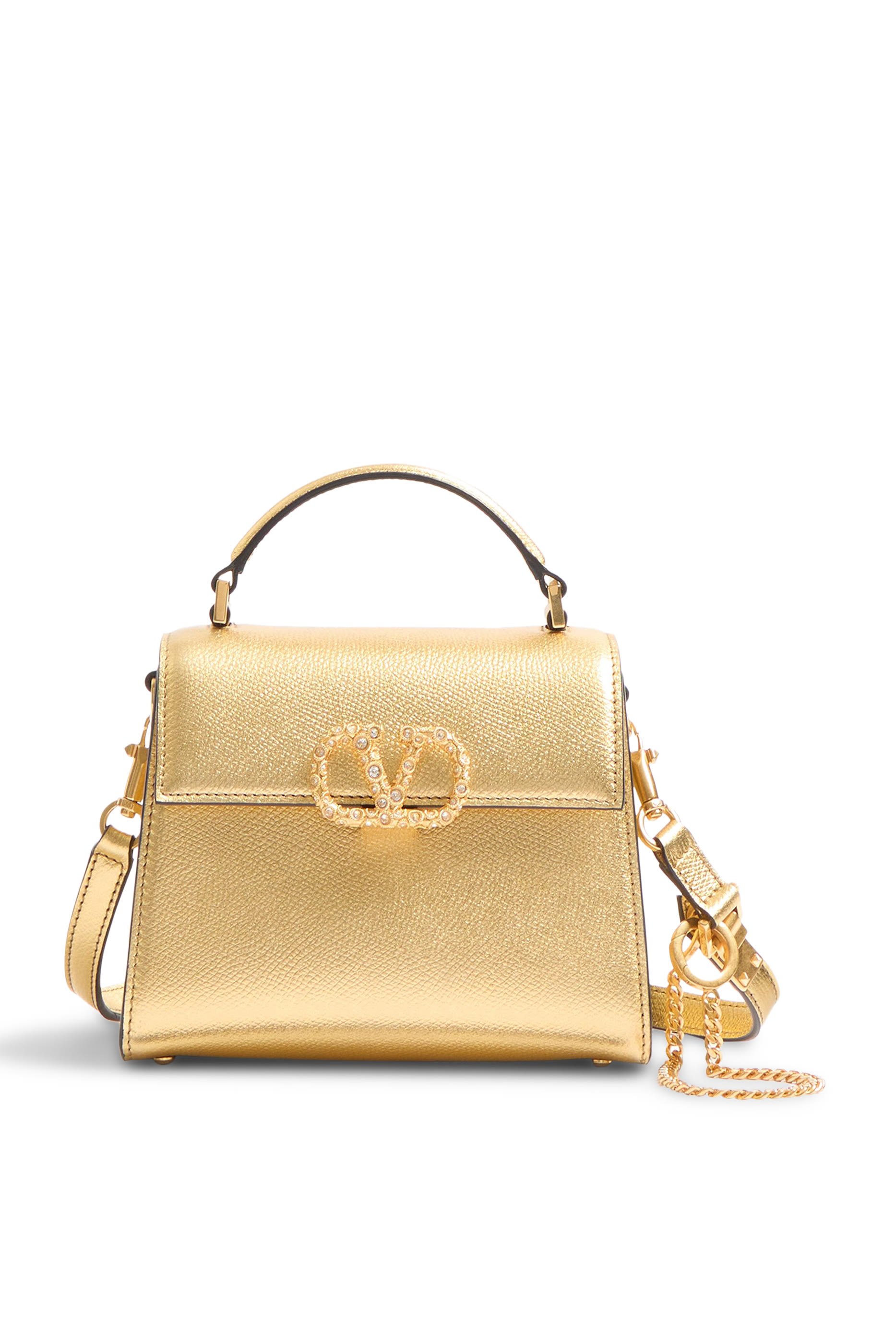 حقيبة يد بشعار الماركة