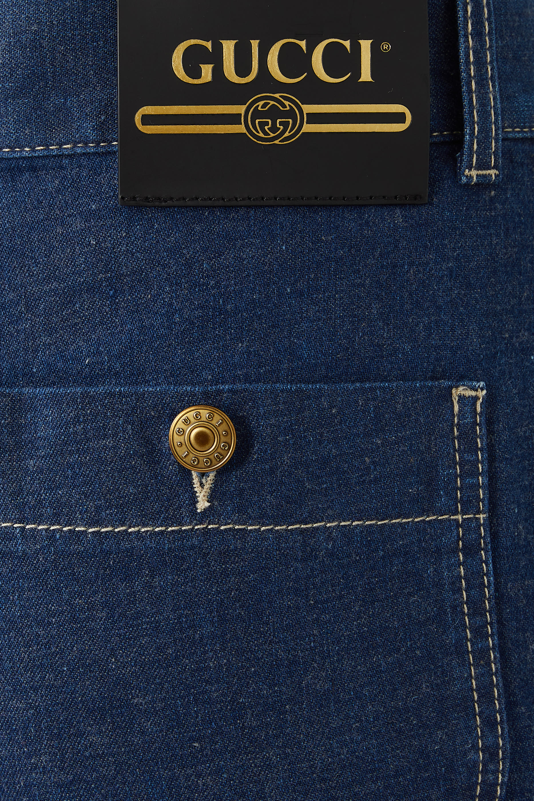 بنطال دنيم بأساور بنقشة حروف GG