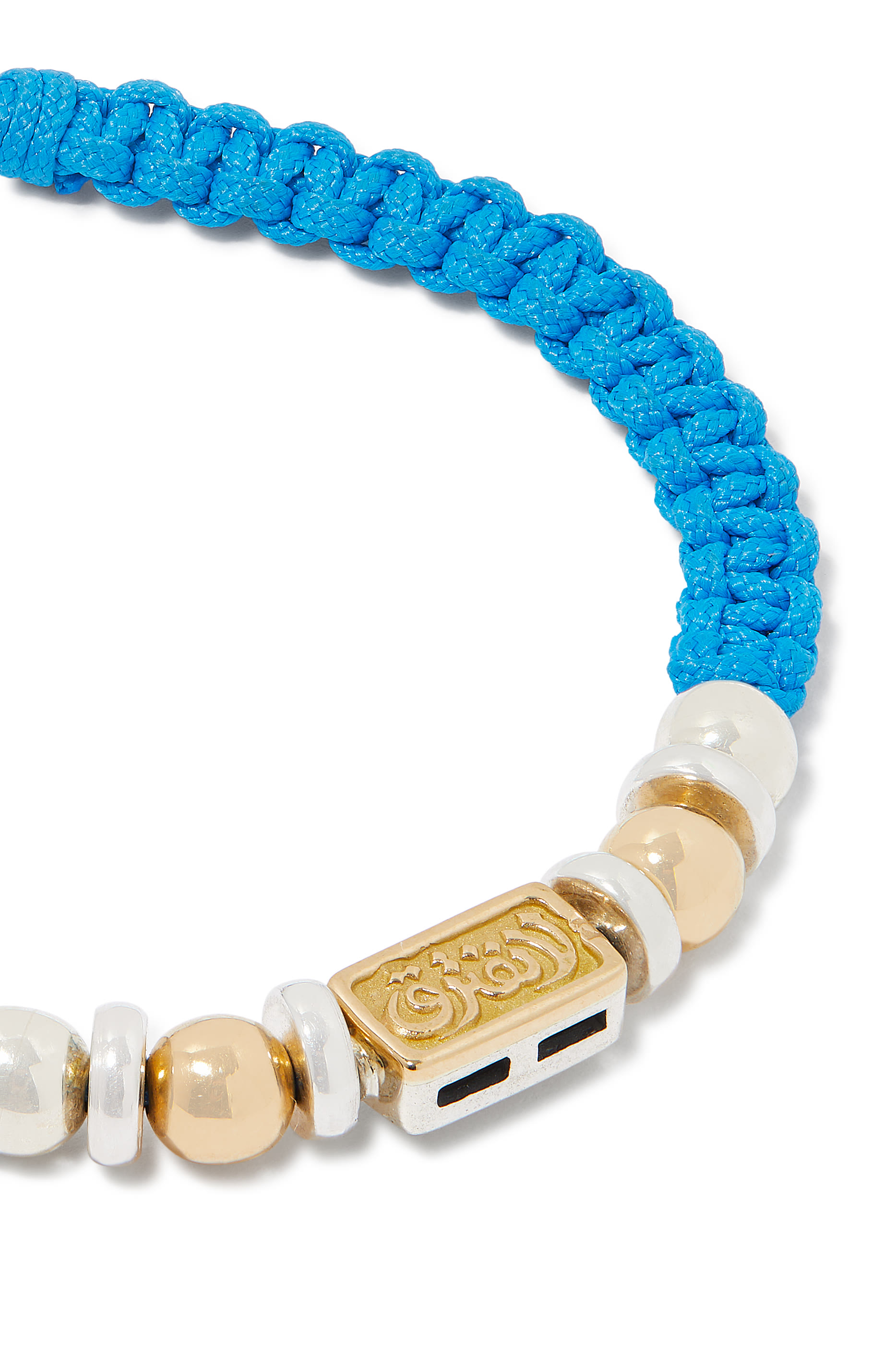 سوار نيفر أبارت بتصميم مضفر، ذهب أصفر عيار 18، فضة استرلينية وقماش. 