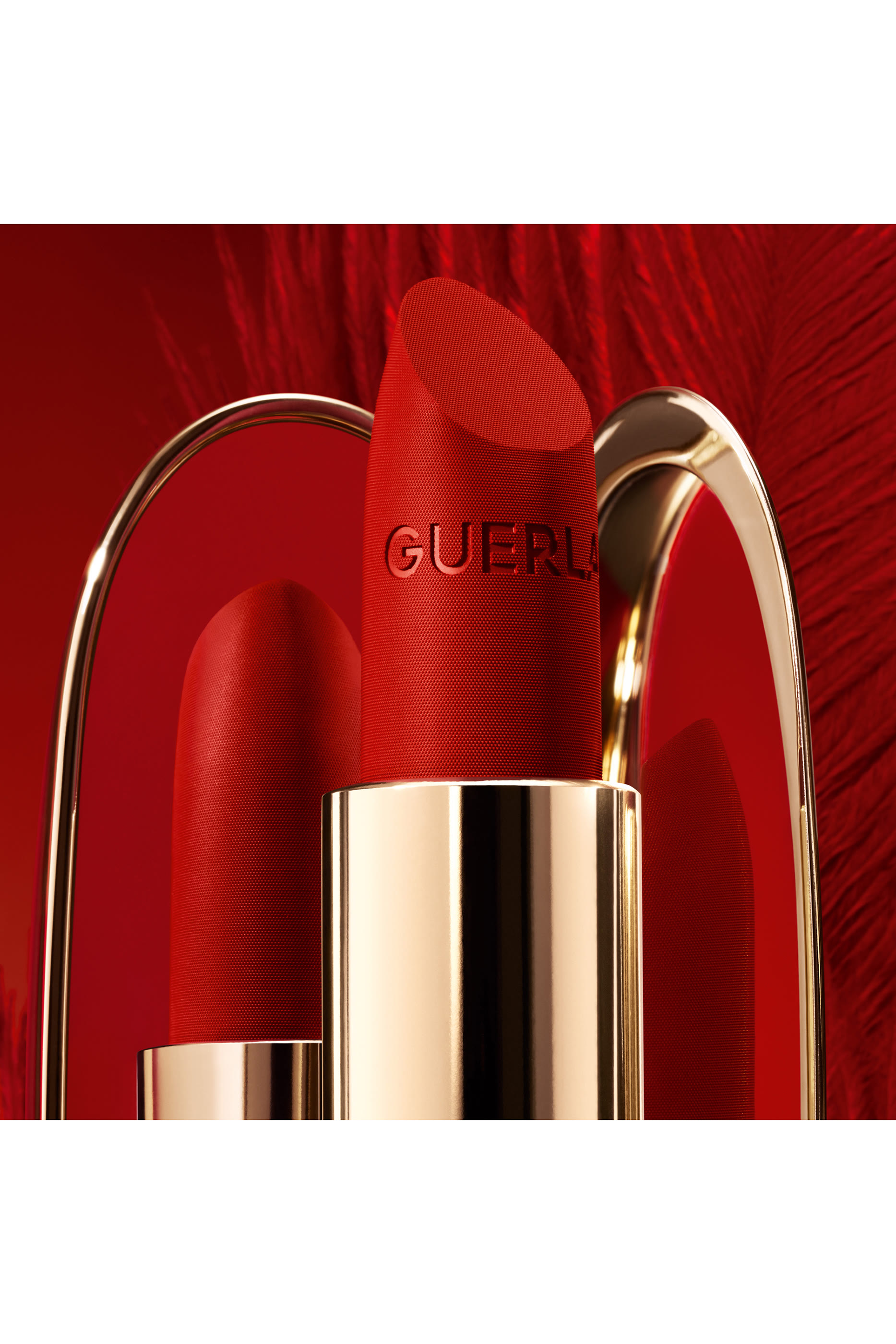 عبوة أحمر شفاه روج جي بنقشة ريش طائر العنقاء