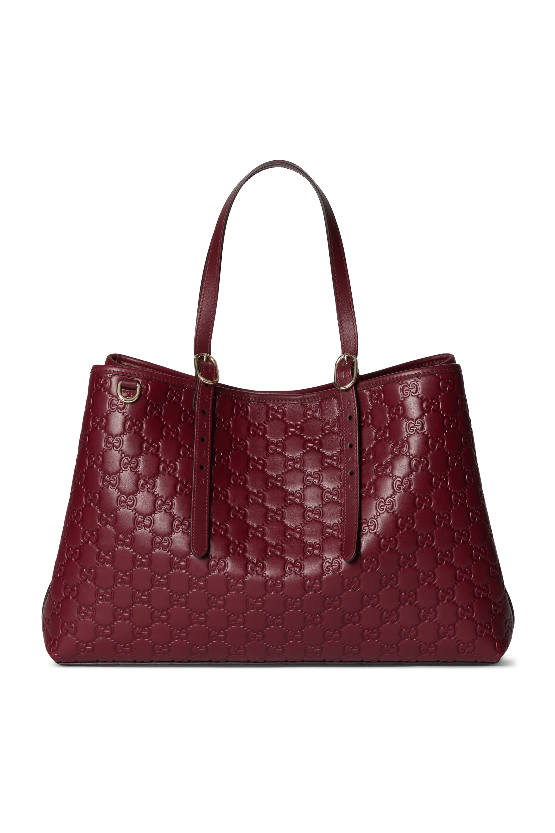 حقيبة يد كبيرة مزينة بشعار الماركة