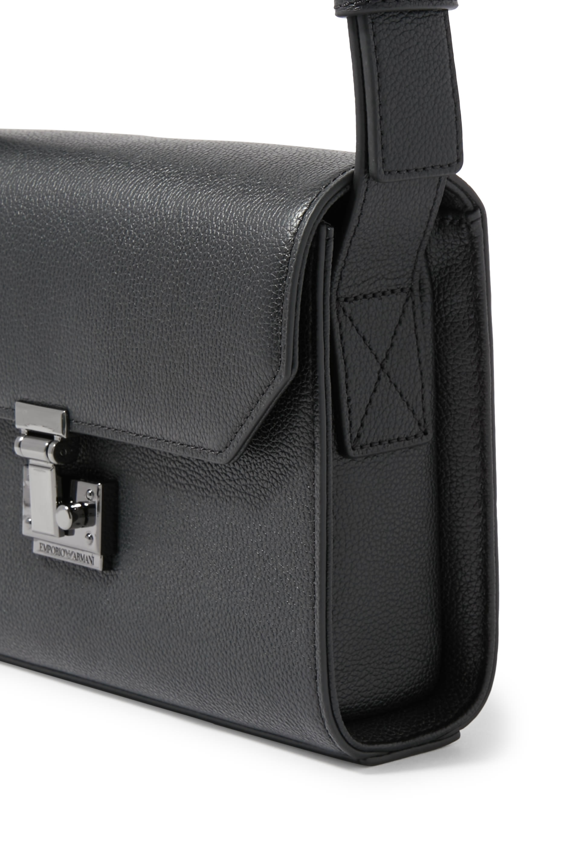 حقيبة كروس بودي بشعار الماركة جلد