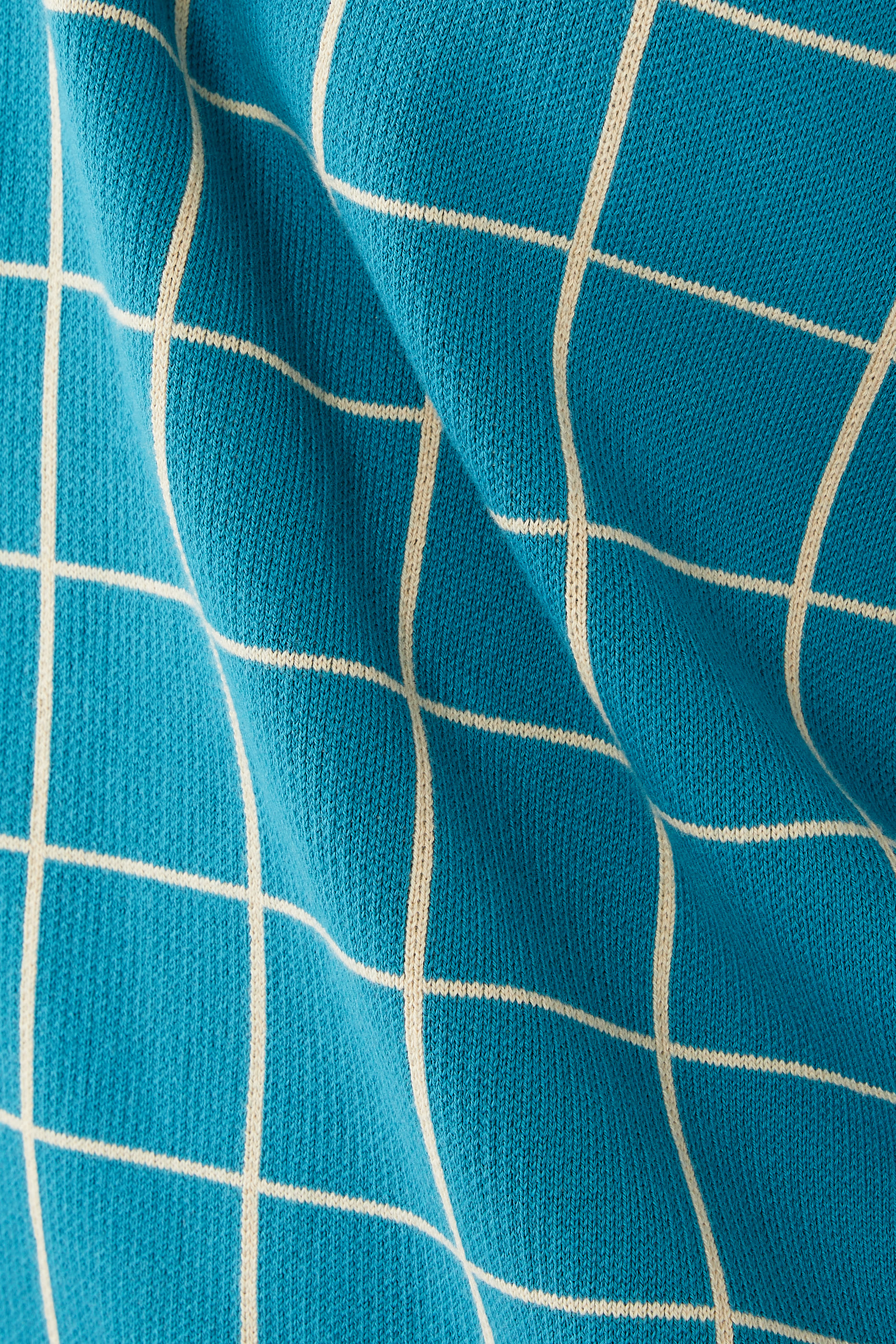 قميص بولو بنقشة مربعات