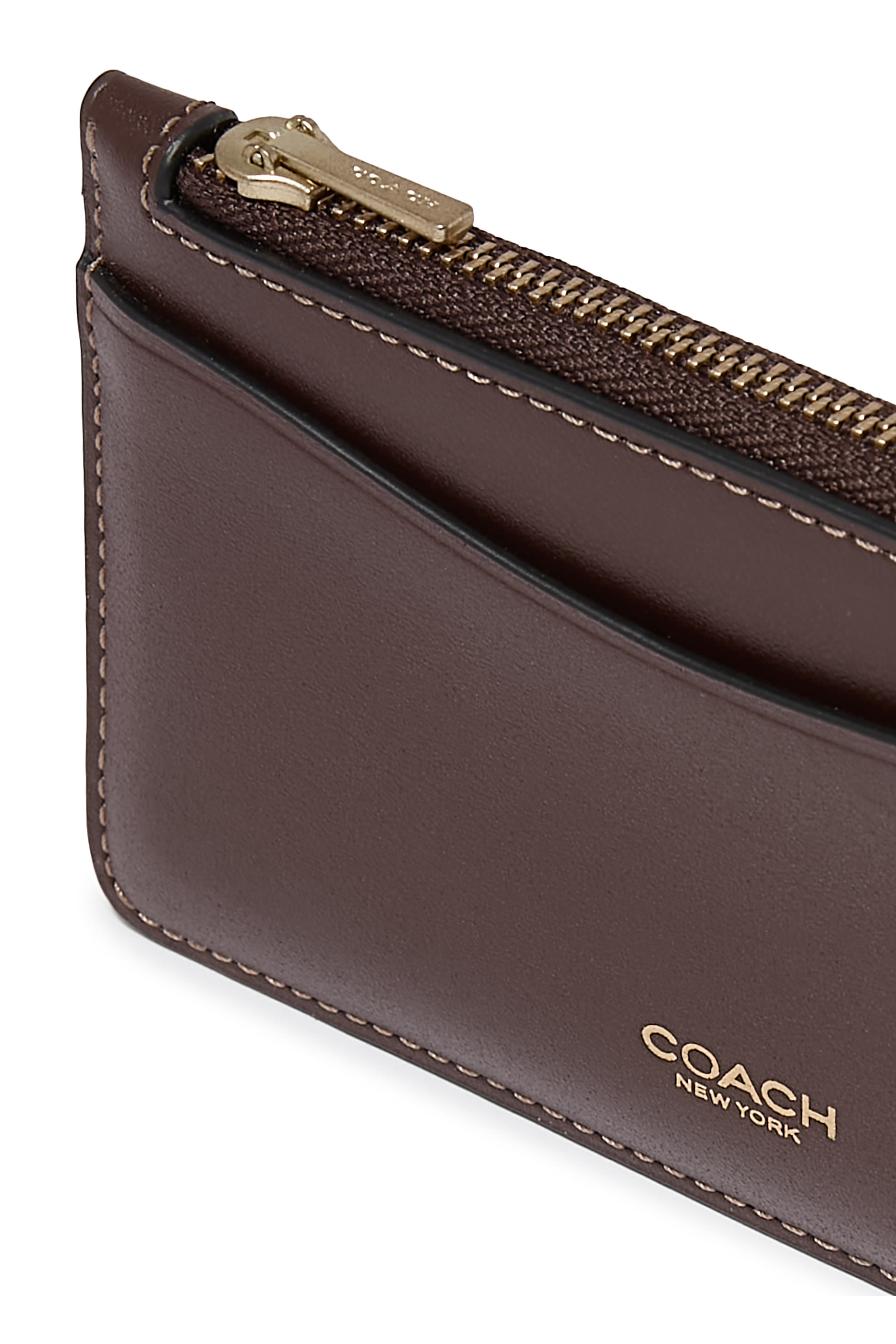 محفظة بسحاب محيط جلد