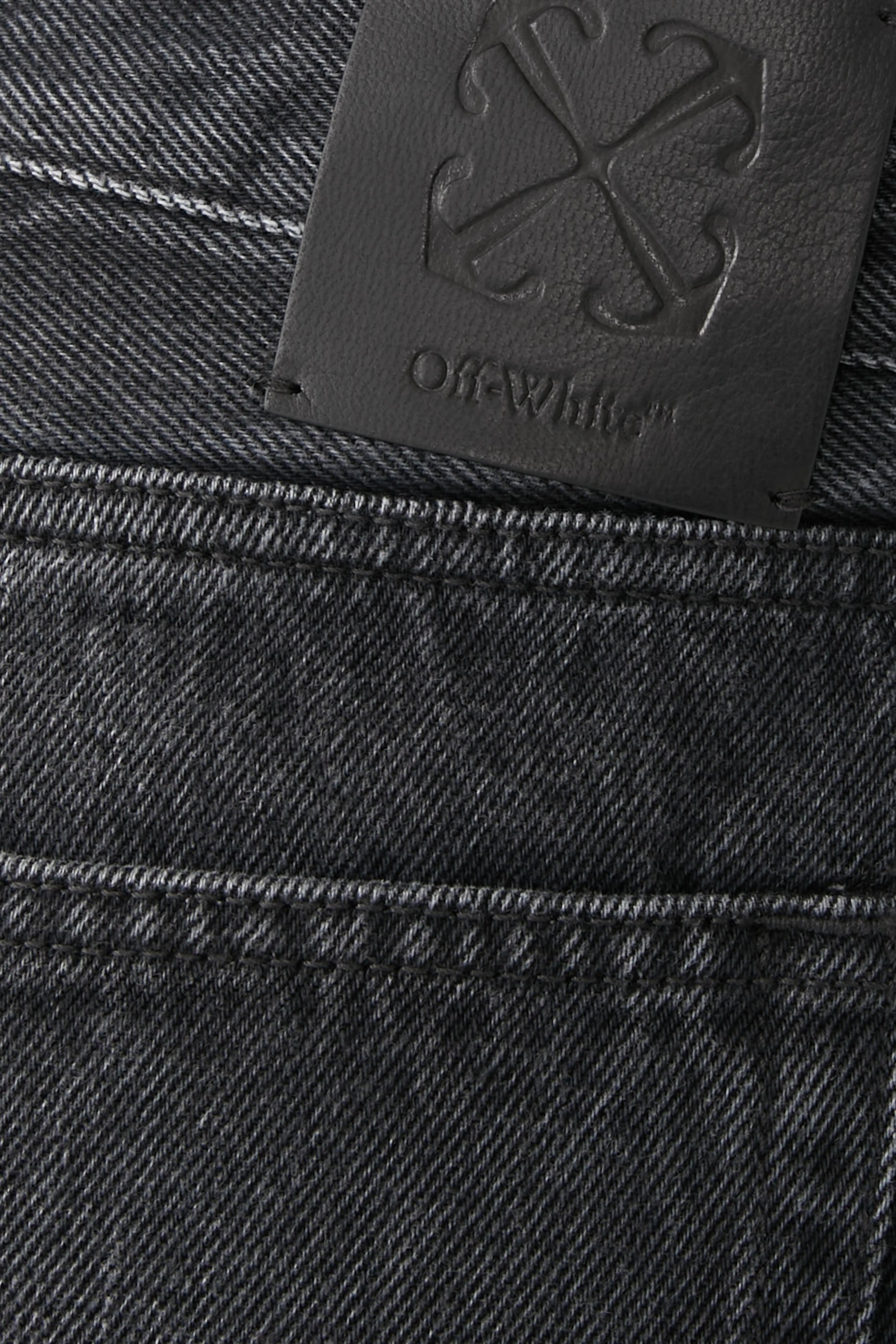 بنطال جينز سكيت بسحاب وشعار الأسهم