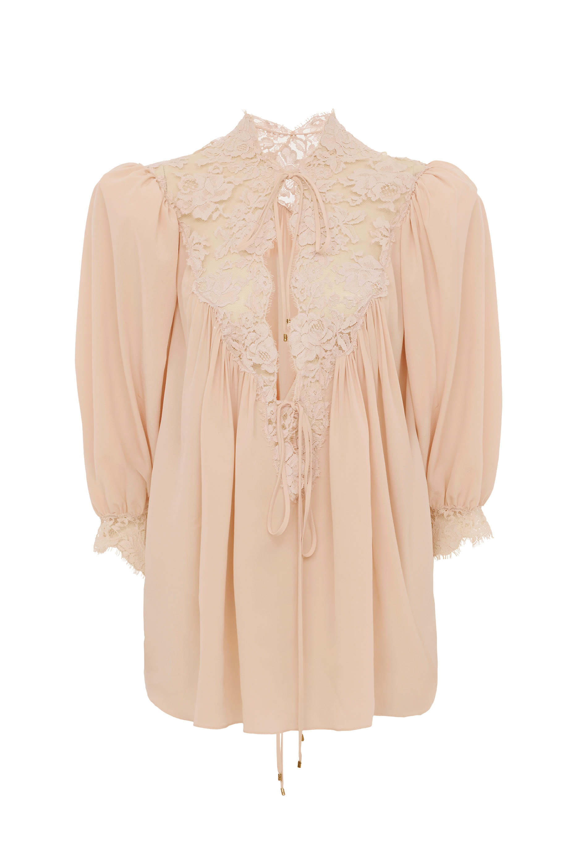 بلوزة بقصة فضفاضة وأكمام منفوخة