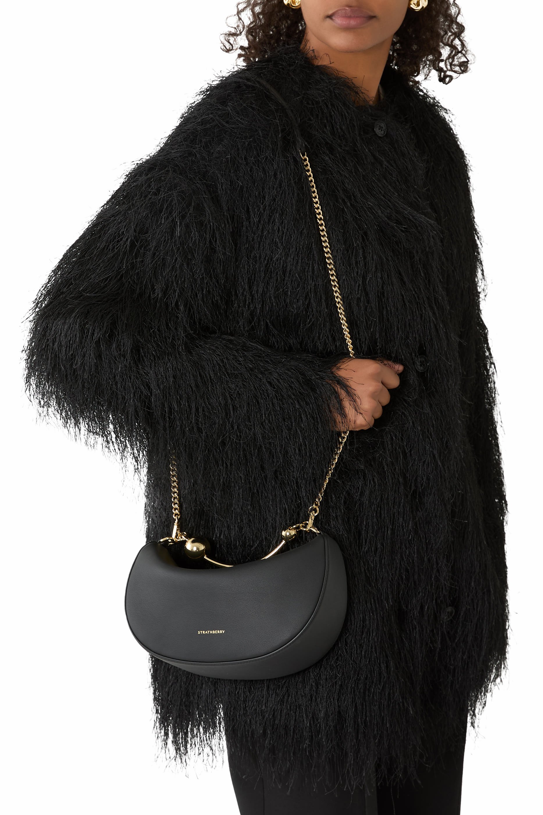 حقيبة صغيرة بتصميم مقوس