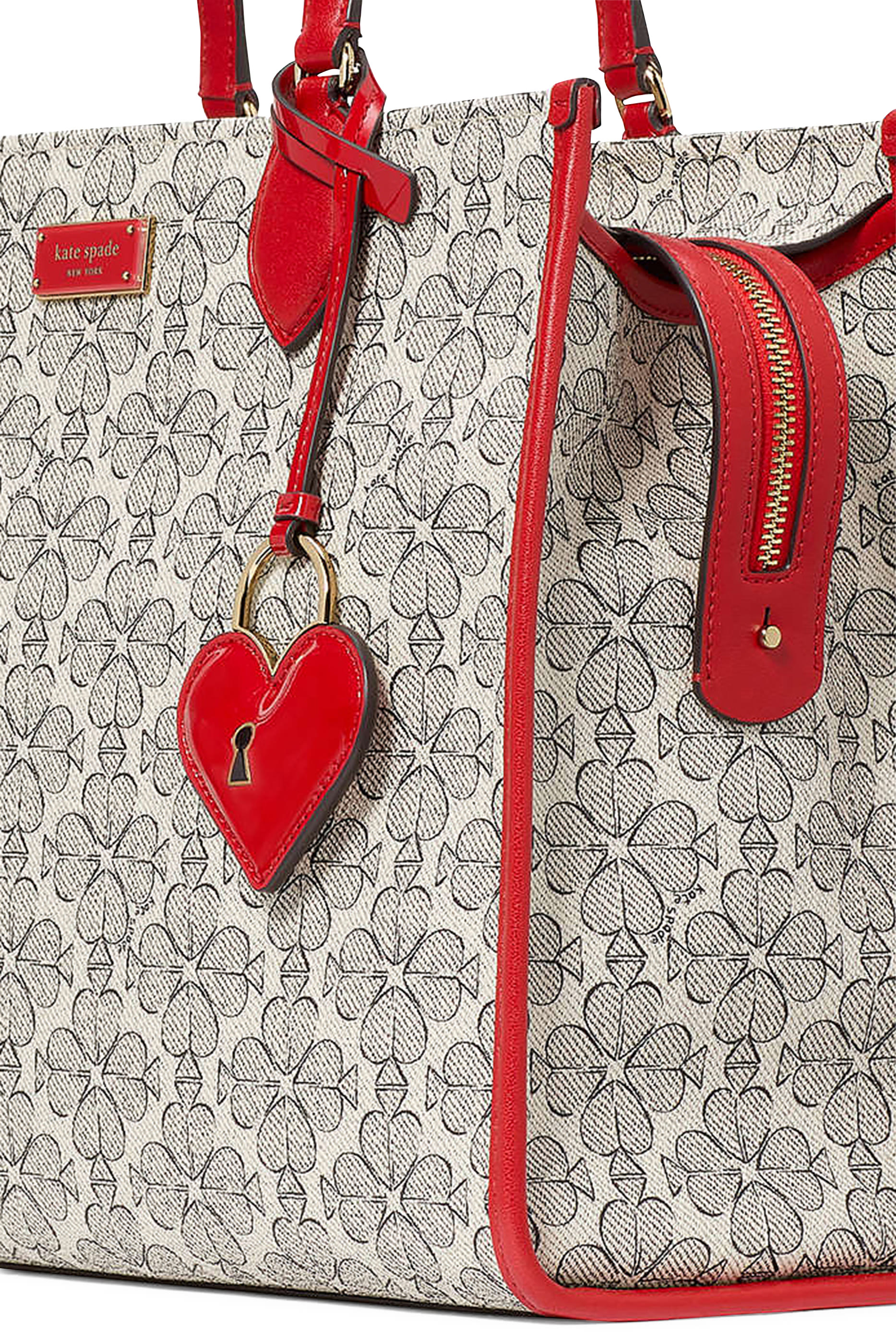 حقيبة يد متوسطة بنقشة زهور بالشكل البستوني