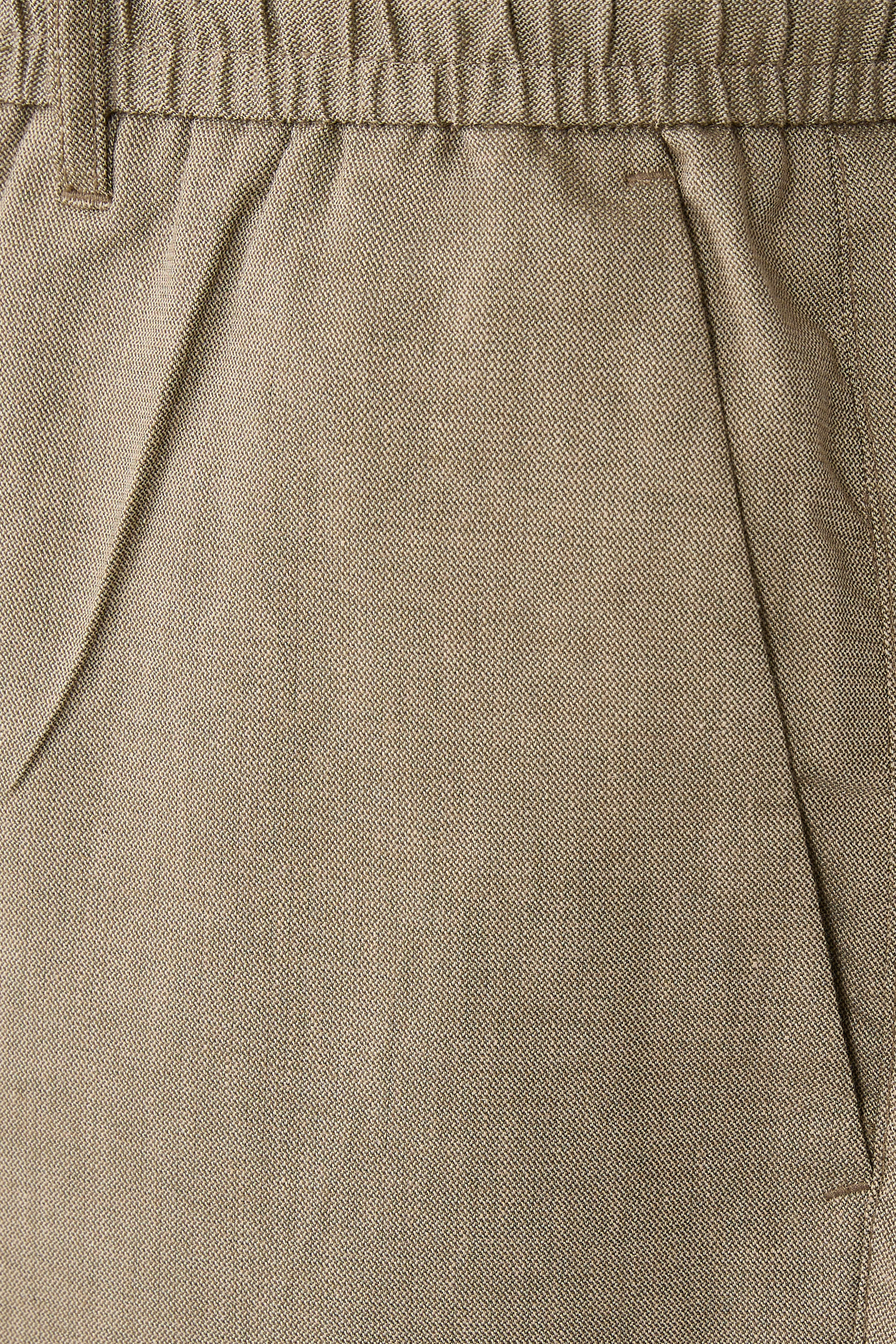 بنطال كومو بقصة تضيق باتجاه الأسفل تويل خفيف