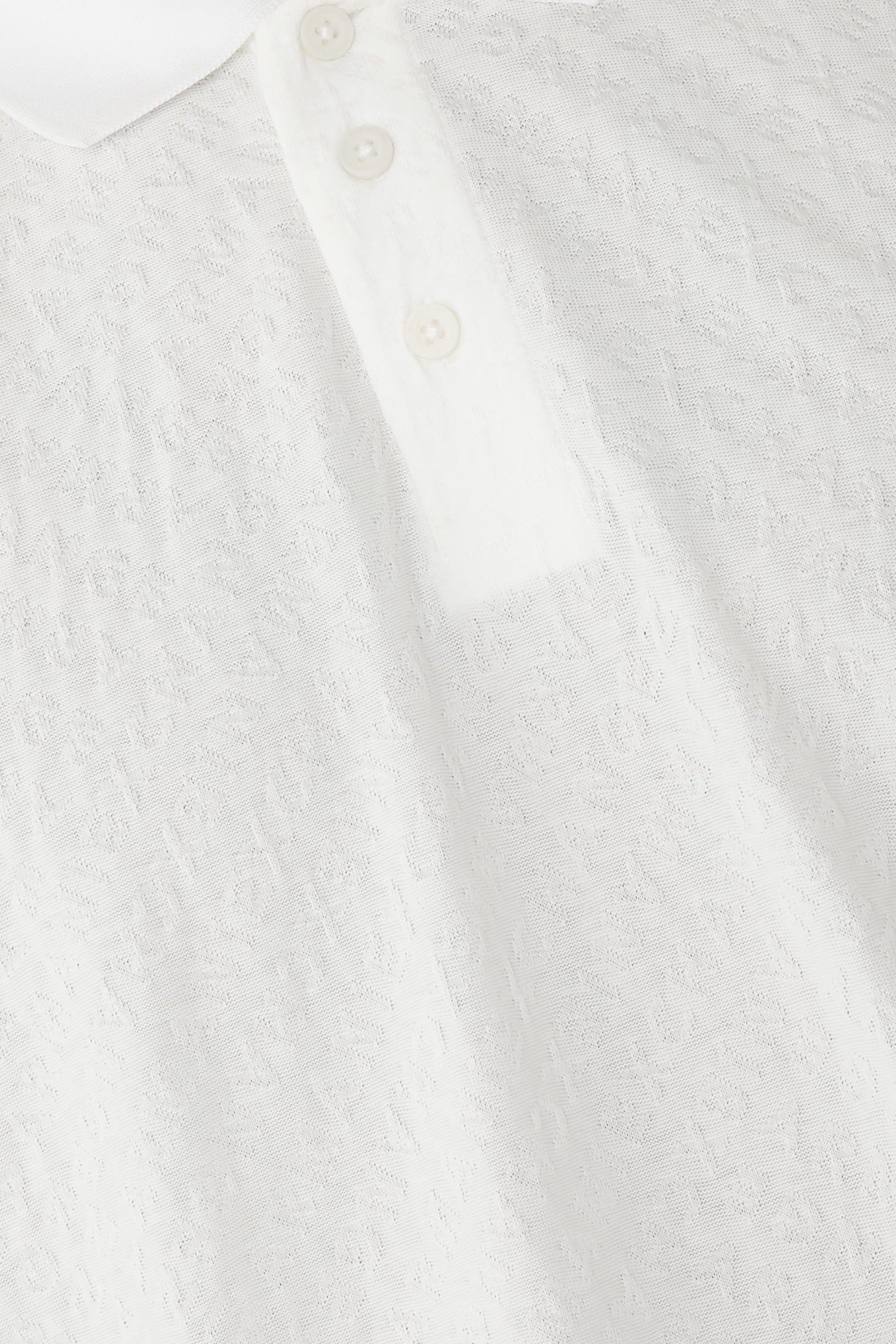 قميص بولو مزين بشعار الماركة