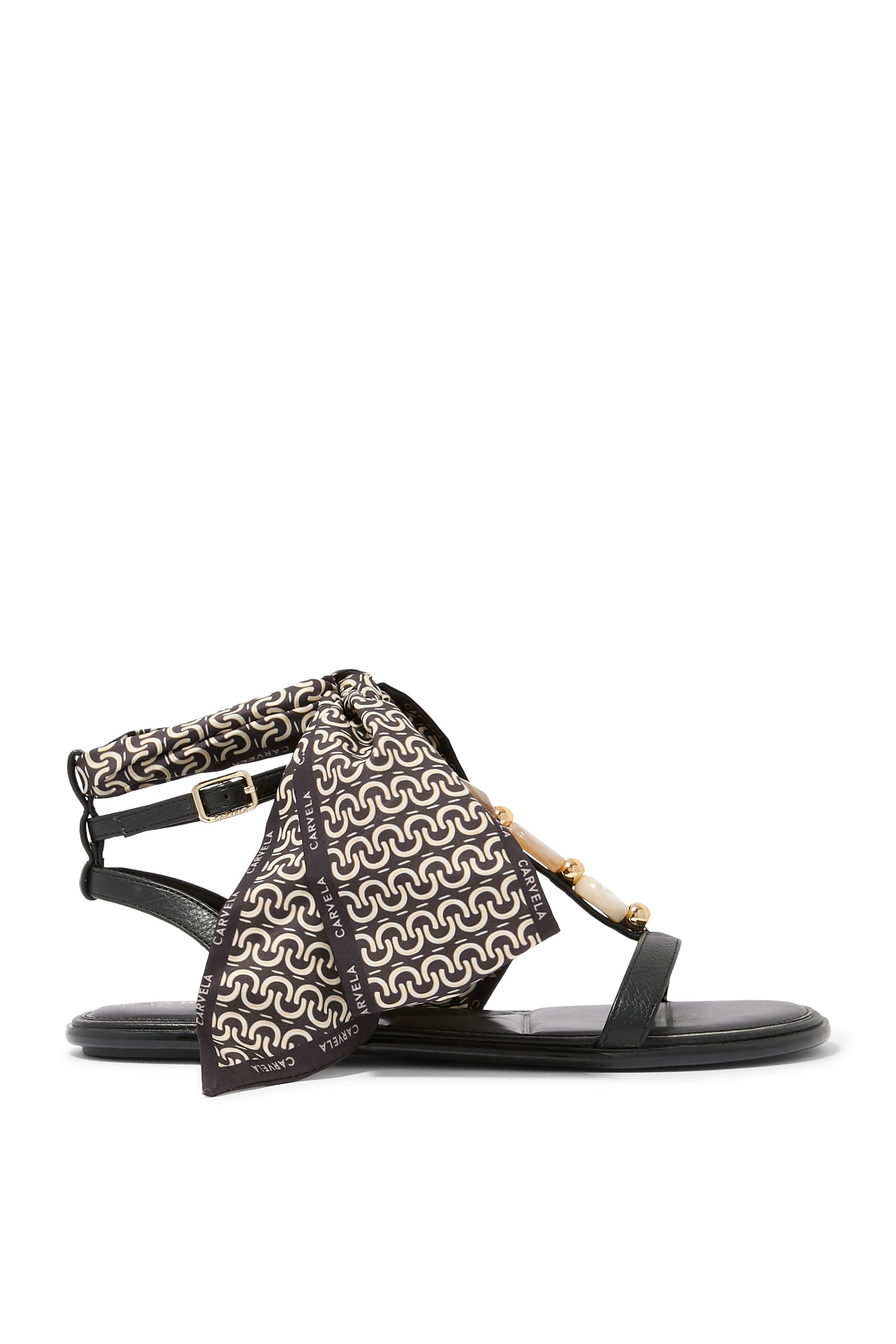 صندل سورينتو بنعل مسطح مزين بأحجار